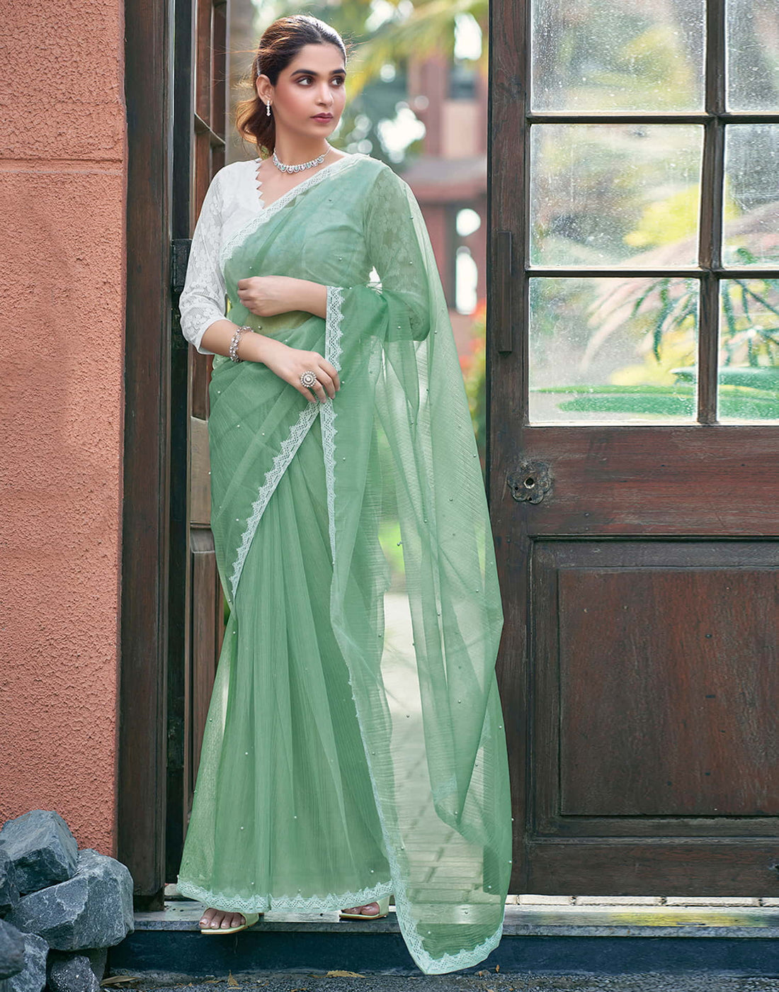 Pista Green Shimmer Dyed Embellished Saree