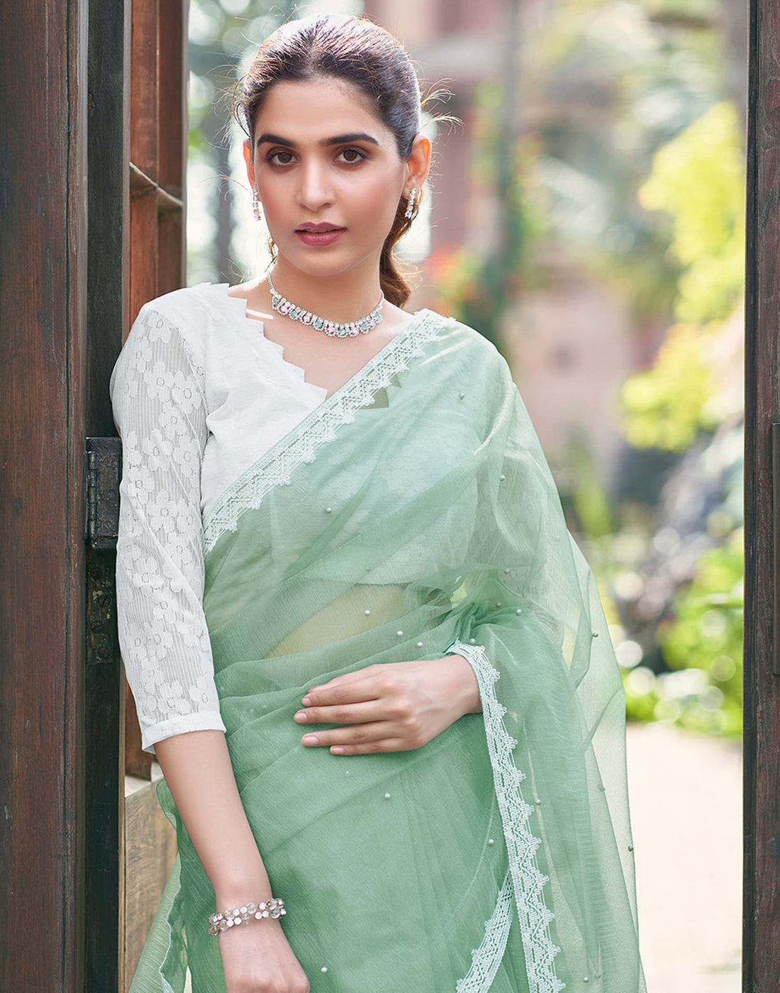 Pista Green Shimmer Dyed Embellished Saree