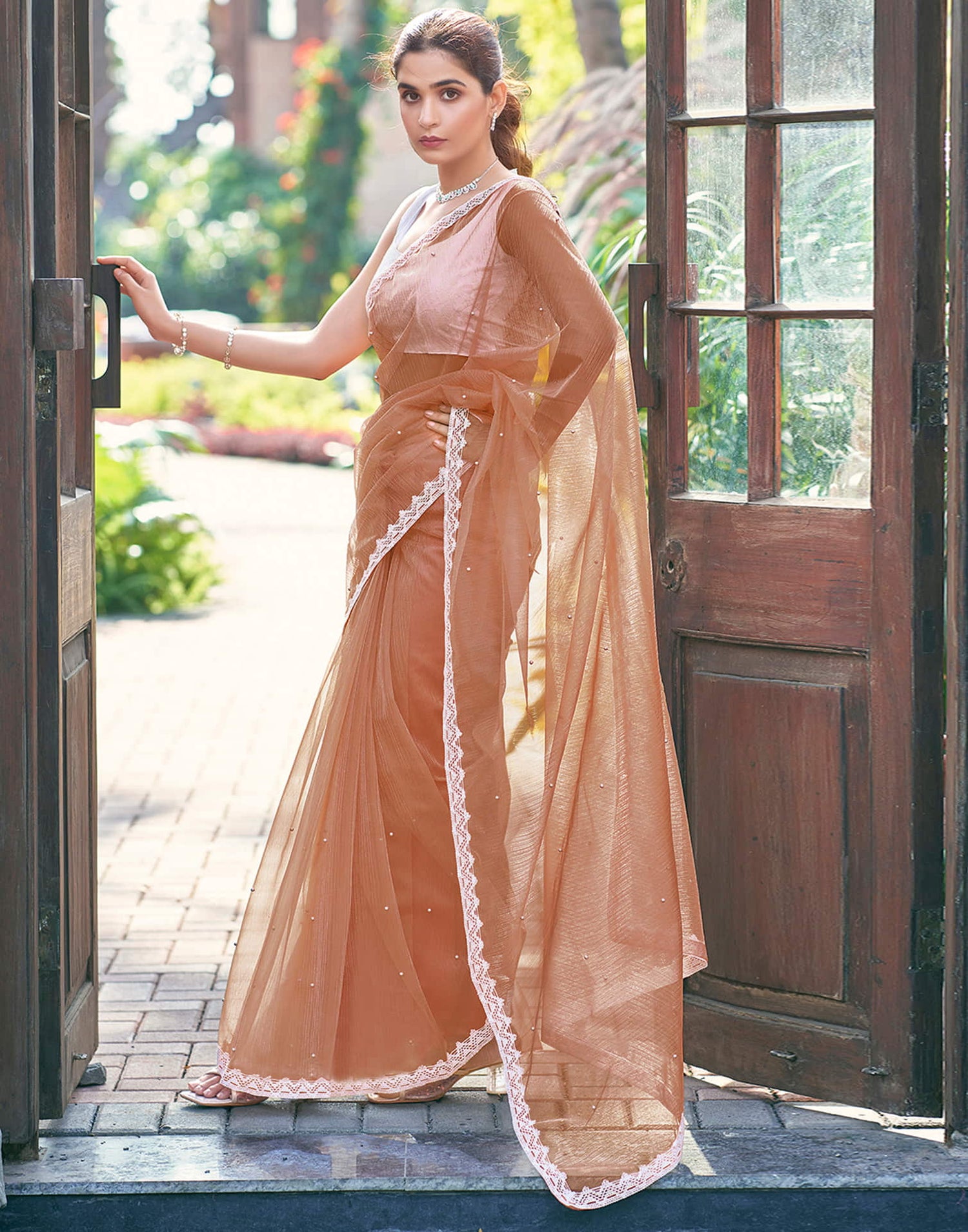 Light Peach Shimmer Dyed Embellished Saree