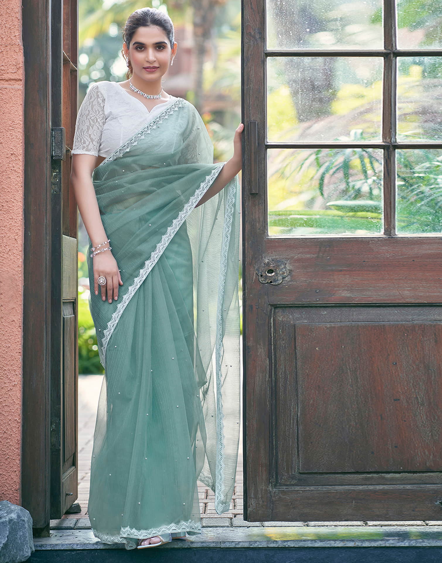 Turquoise Shimmer Dyed Embellished Saree