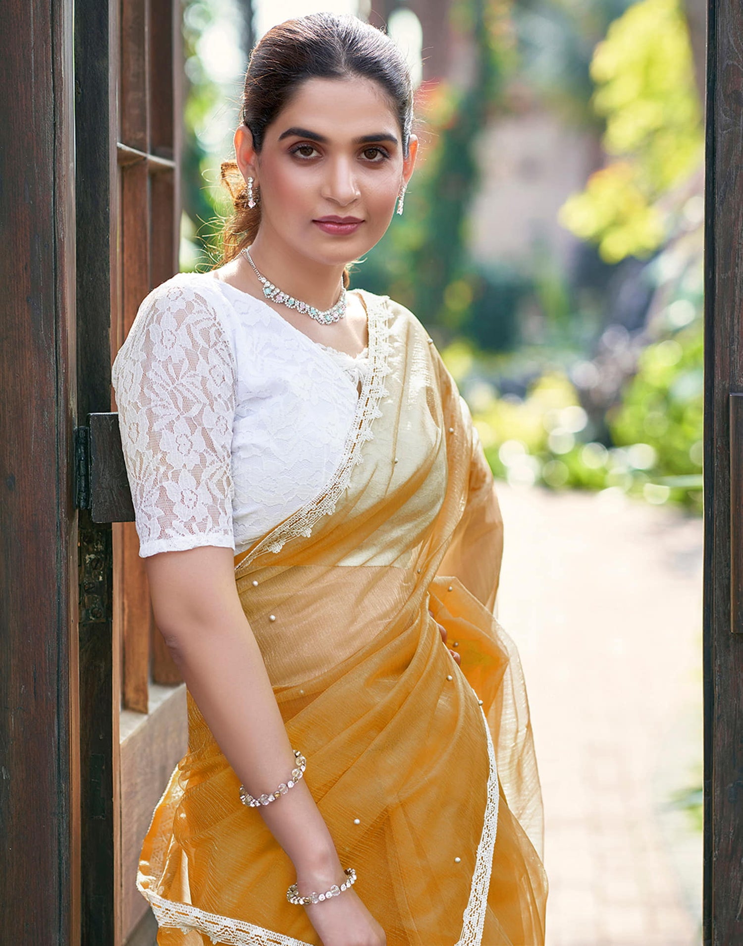 Turmeric Yellow Shimmer Dyed Embellished Saree