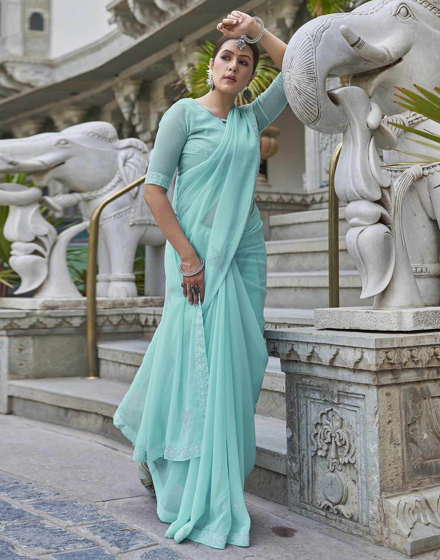 Turquoise Swarovski Georgette Stone Work Saree