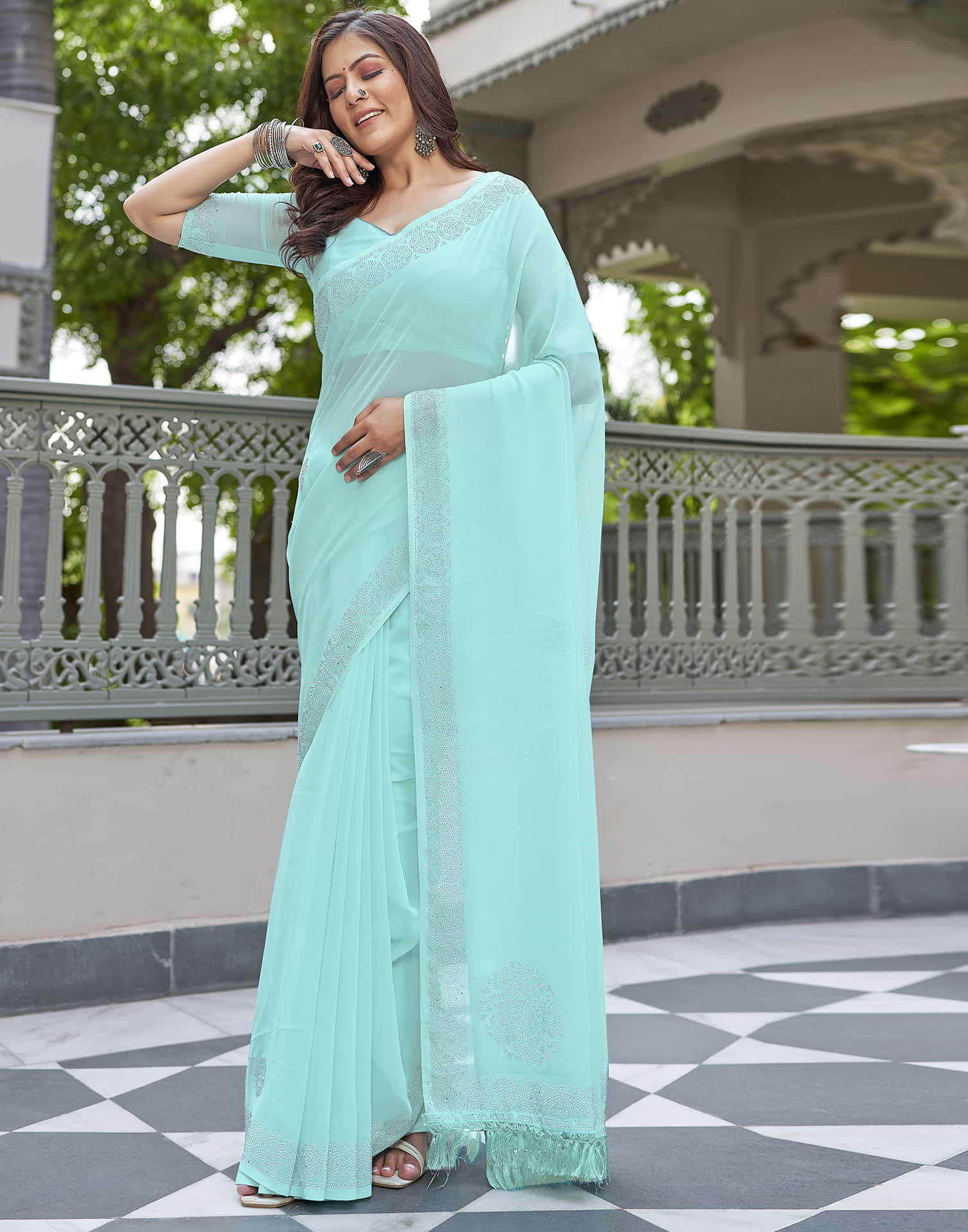 Turquoise Swarovski Georgette Stone Work Saree