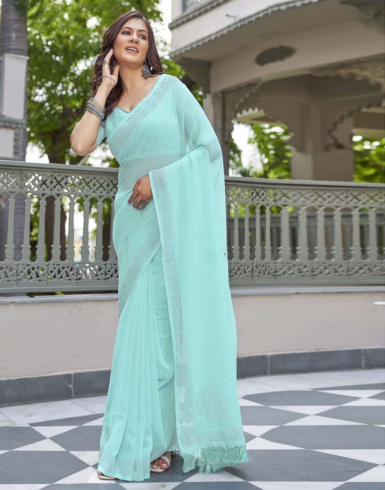 Turquoise Swarovski Georgette Stone Work Saree