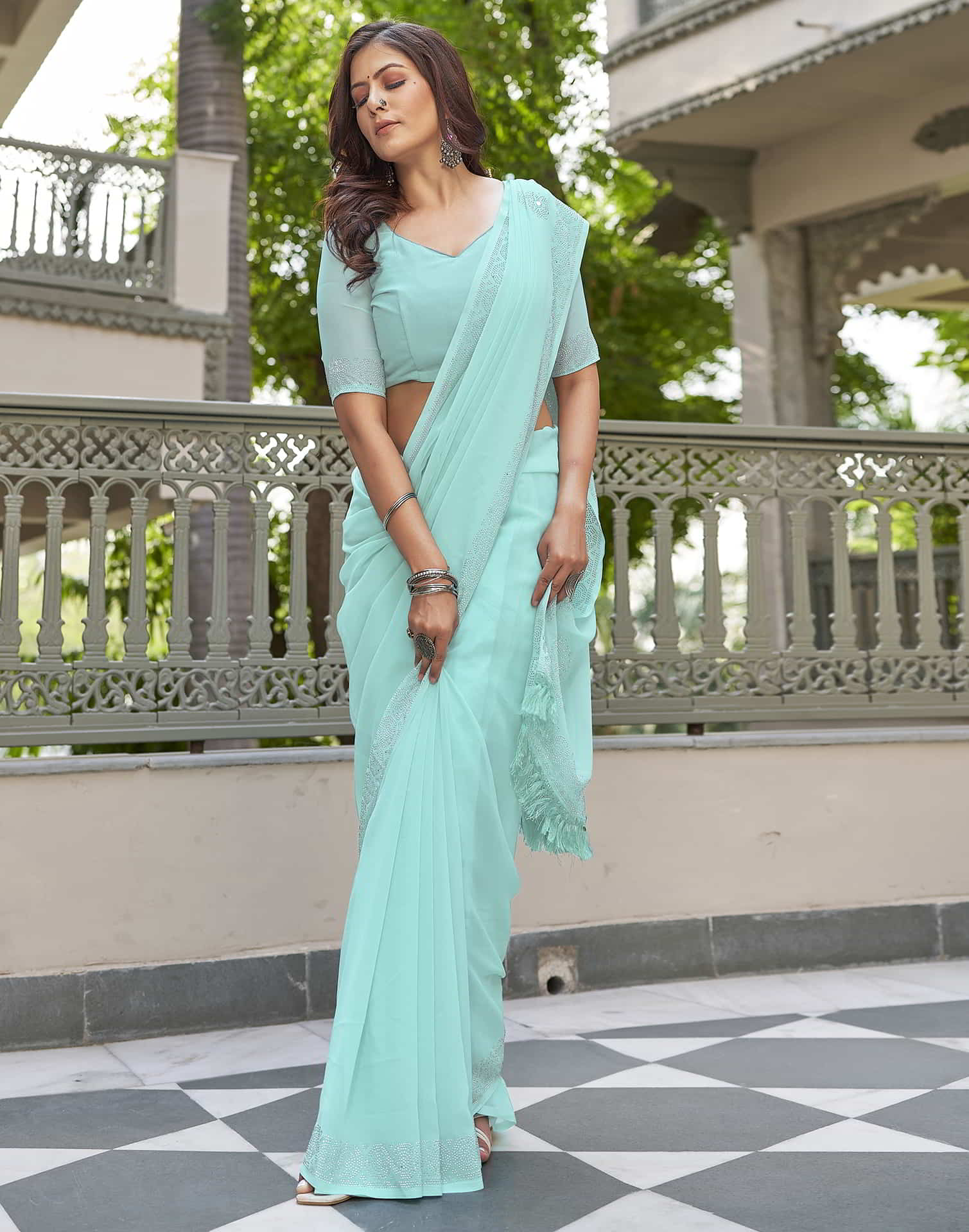 Turquoise Swarovski Georgette Stone Work Saree