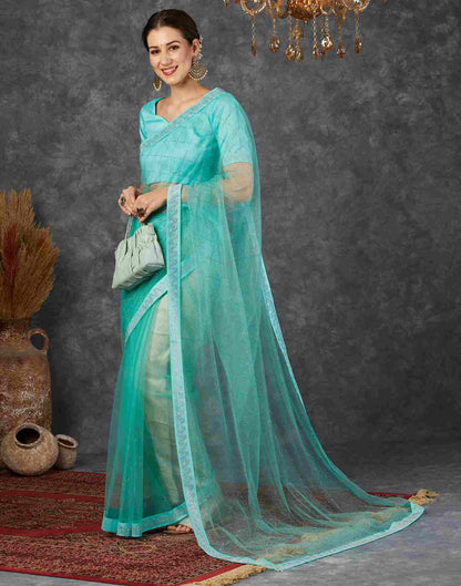 Pale Turquoise Net Plain Printed Saree