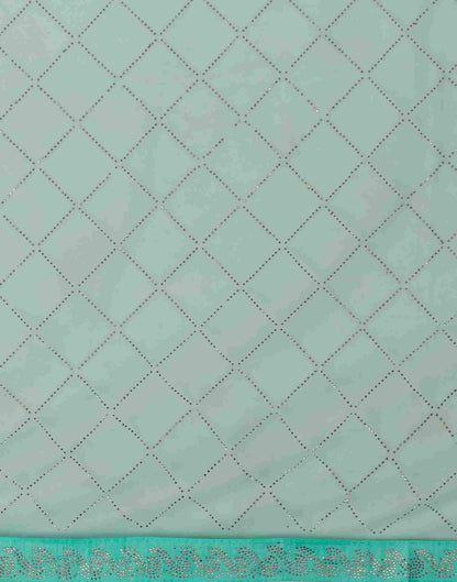 Pale Turquoise Net Plain Printed Saree