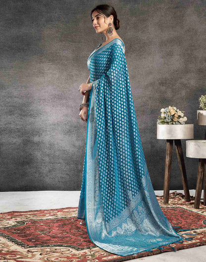 Teal Blue Georgette Woven Foil Printed Saree