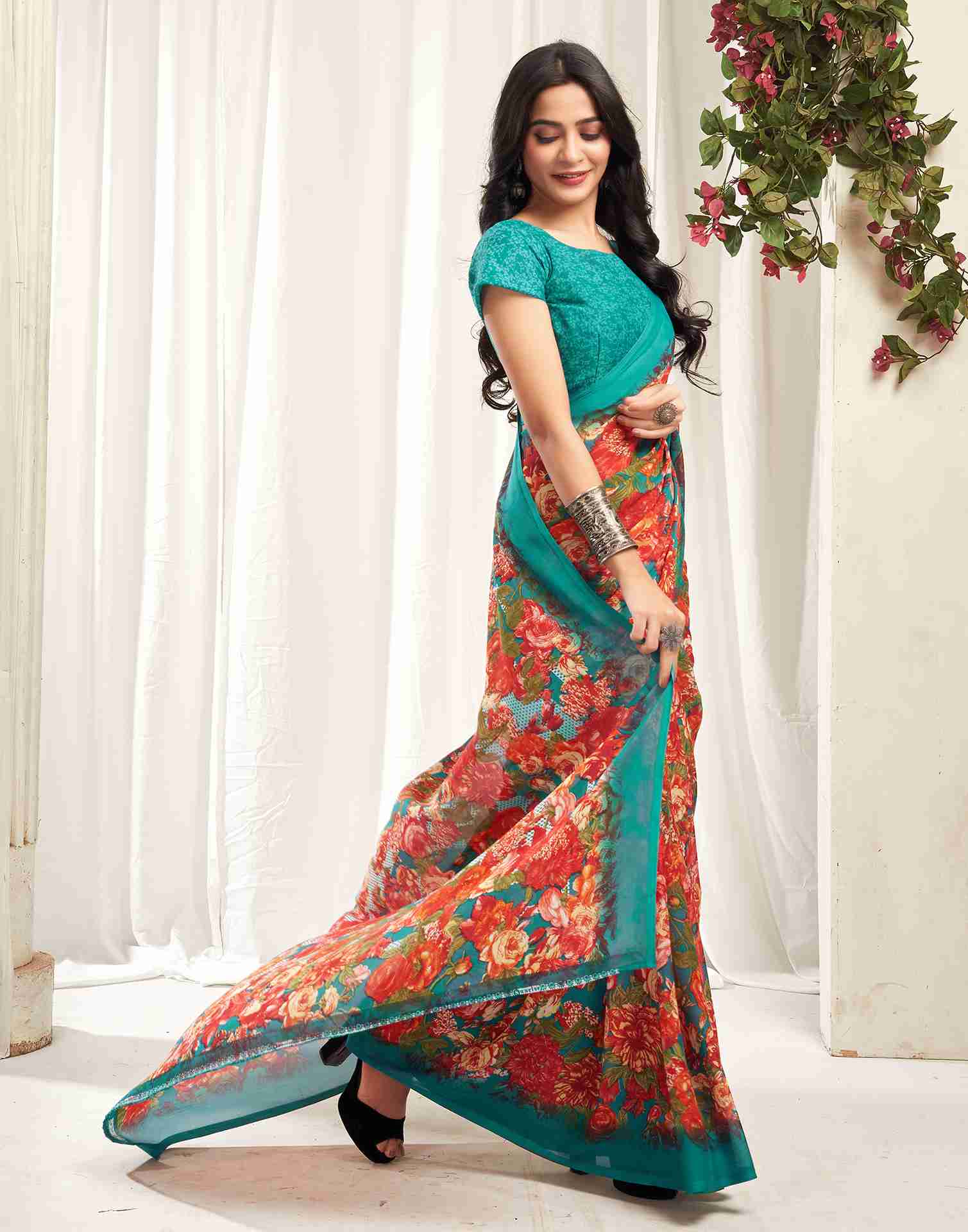 Teal Green Georgette Printed Saree