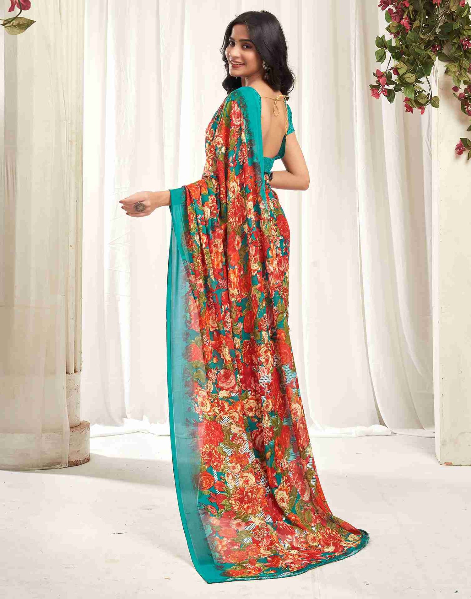 Teal Green Georgette Printed Saree