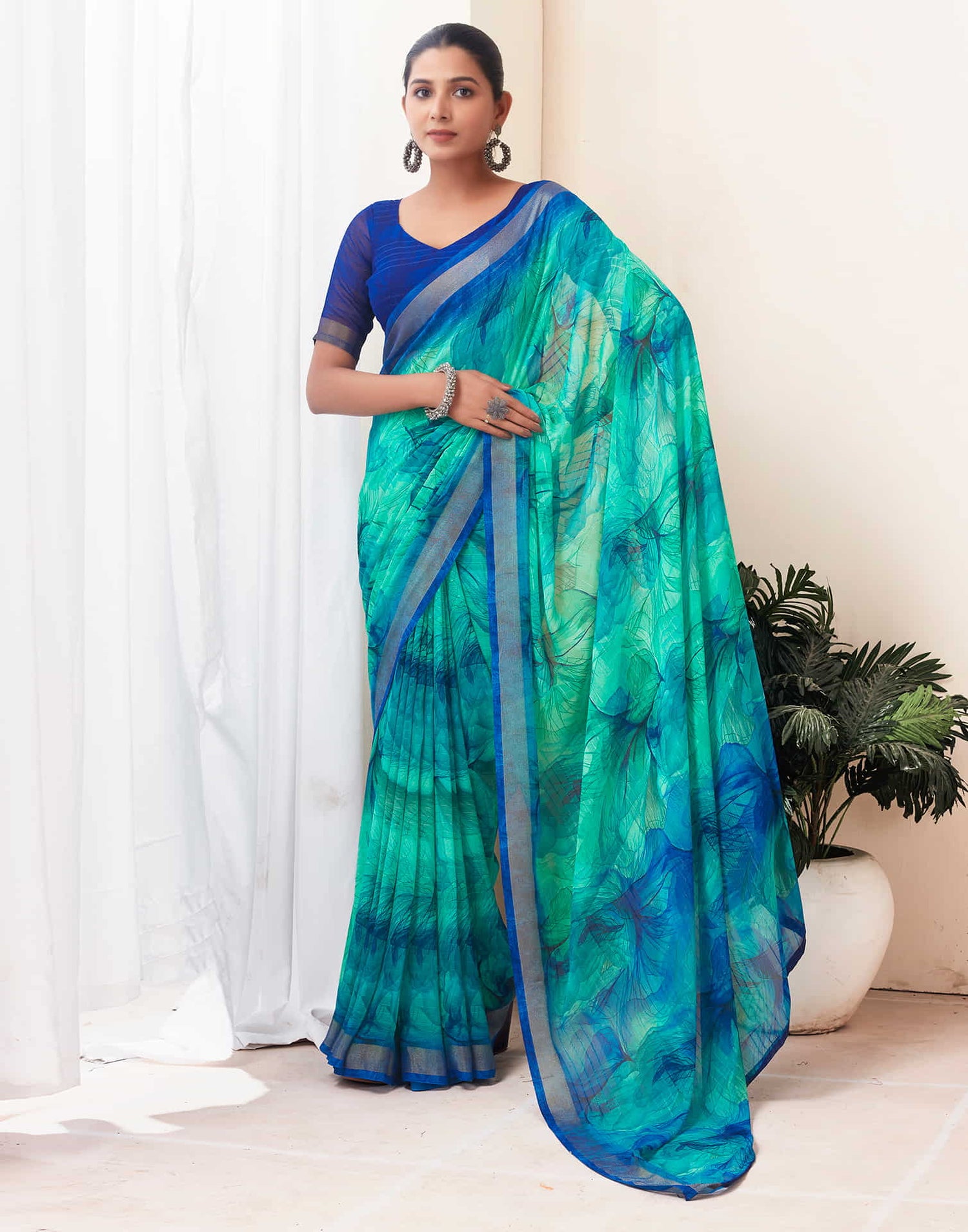 Teal Green Georgette Printed Saree