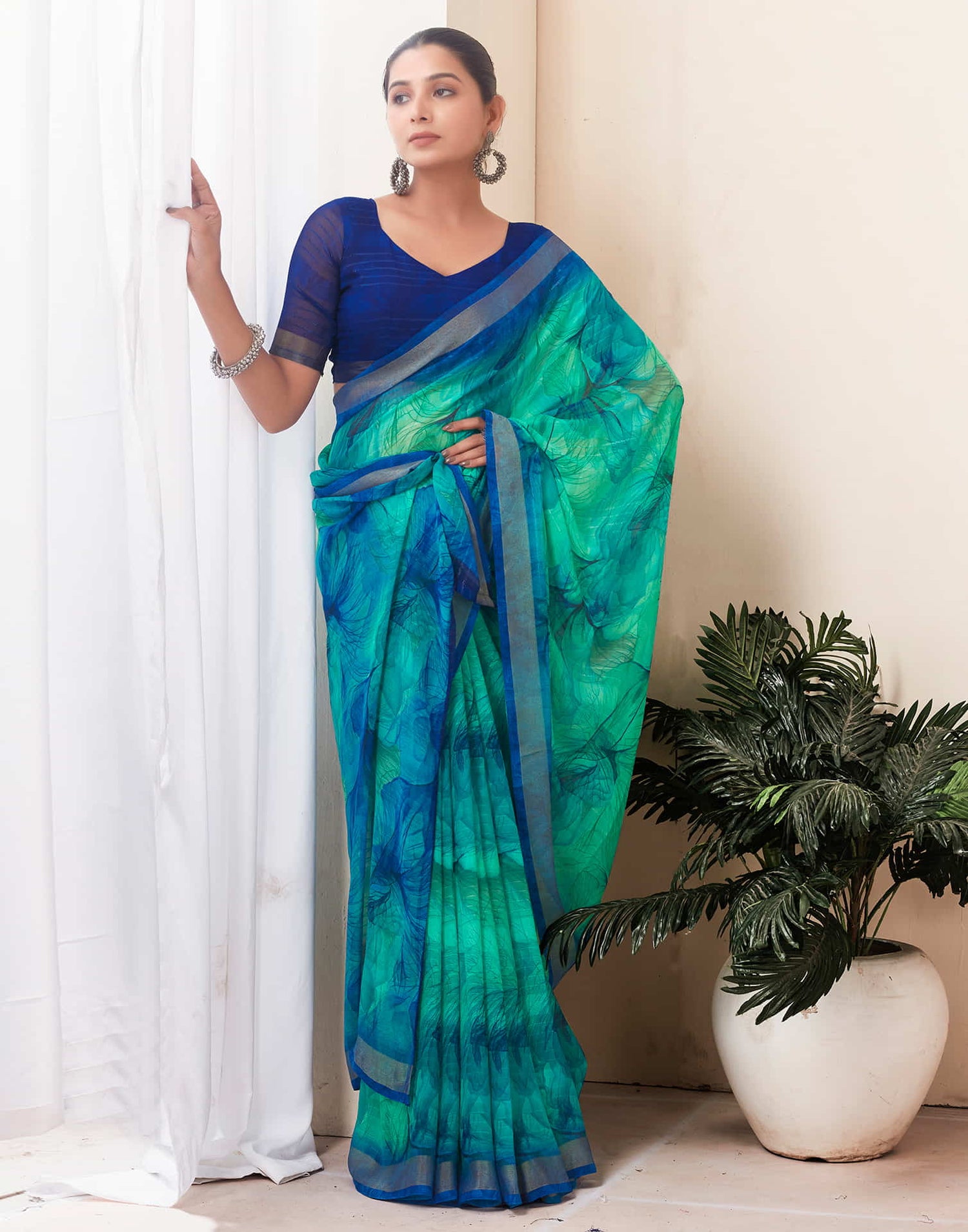 Teal Green Georgette Printed Saree