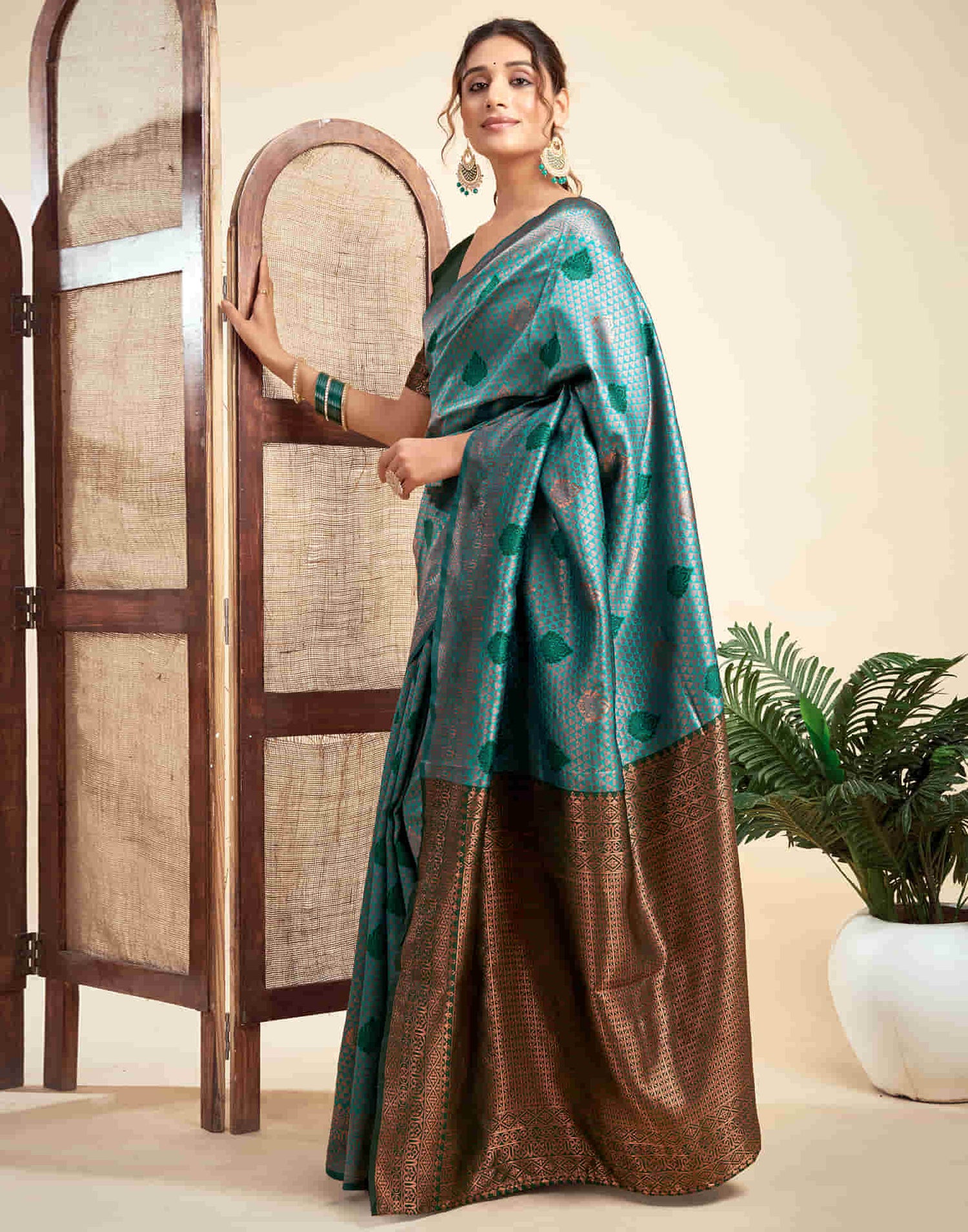 Teal Green Silk Woven Banarasi Saree