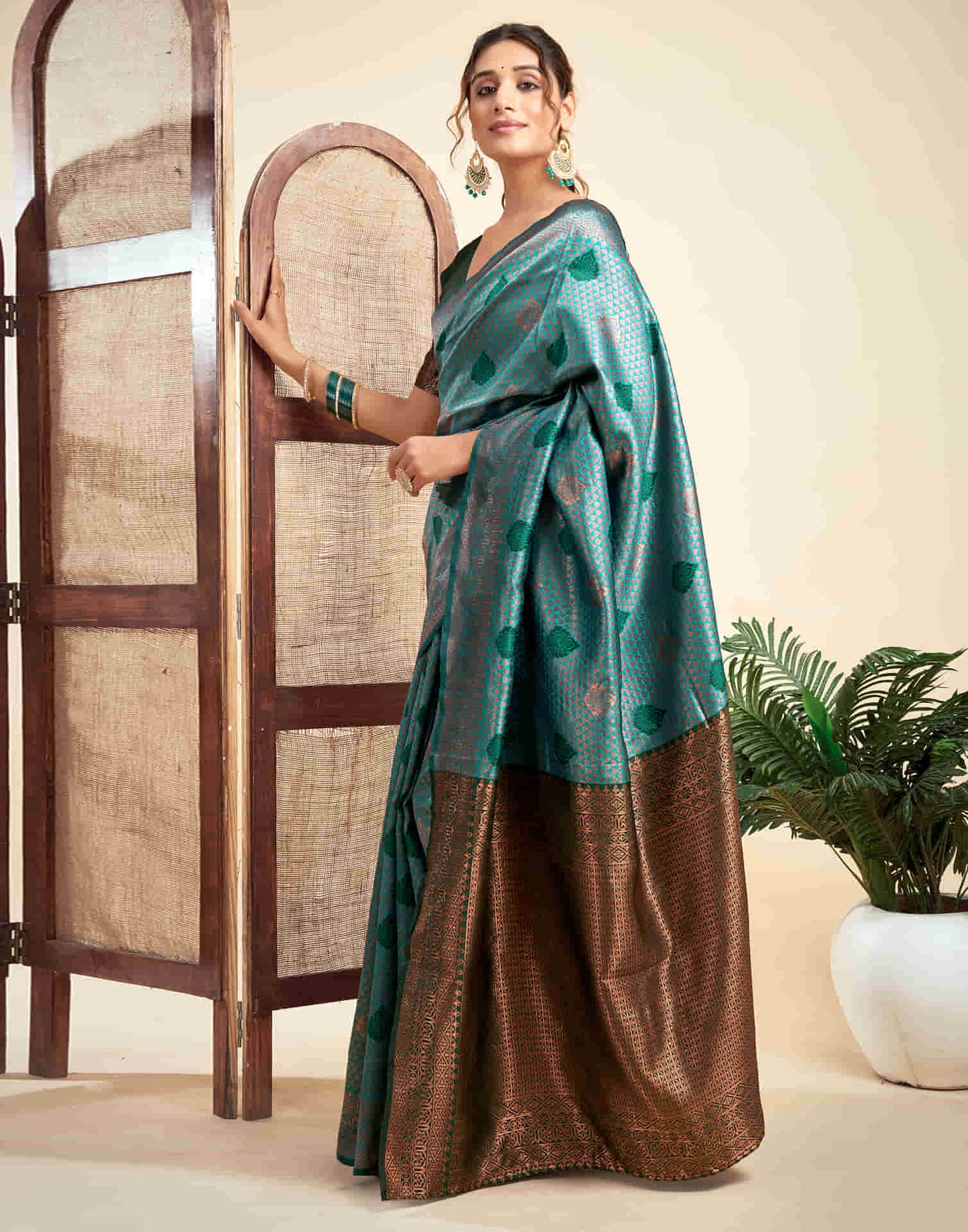 Teal Green Silk Woven Banarasi Saree