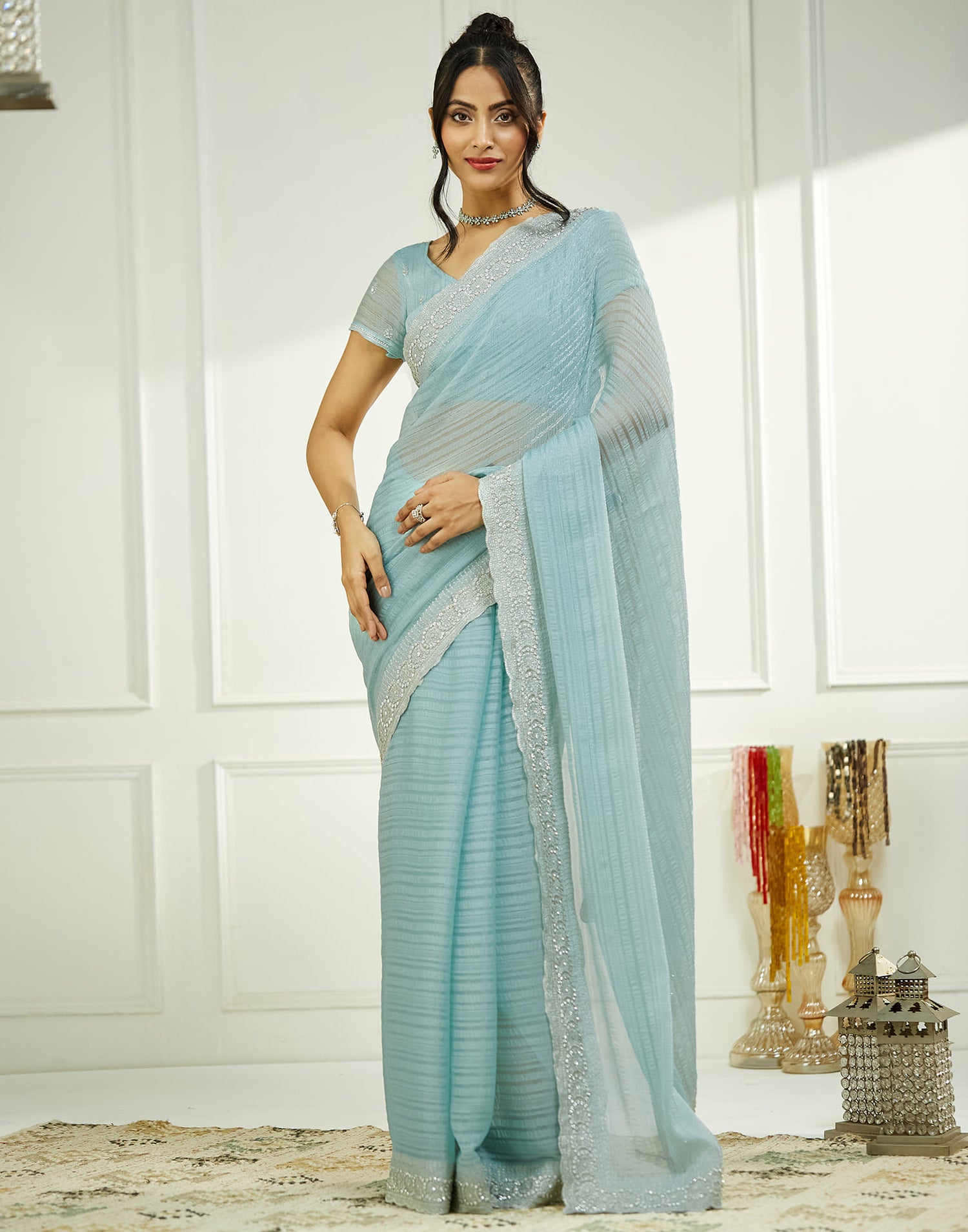 Powder Blue Chiffon Self Woven Embellished Saree