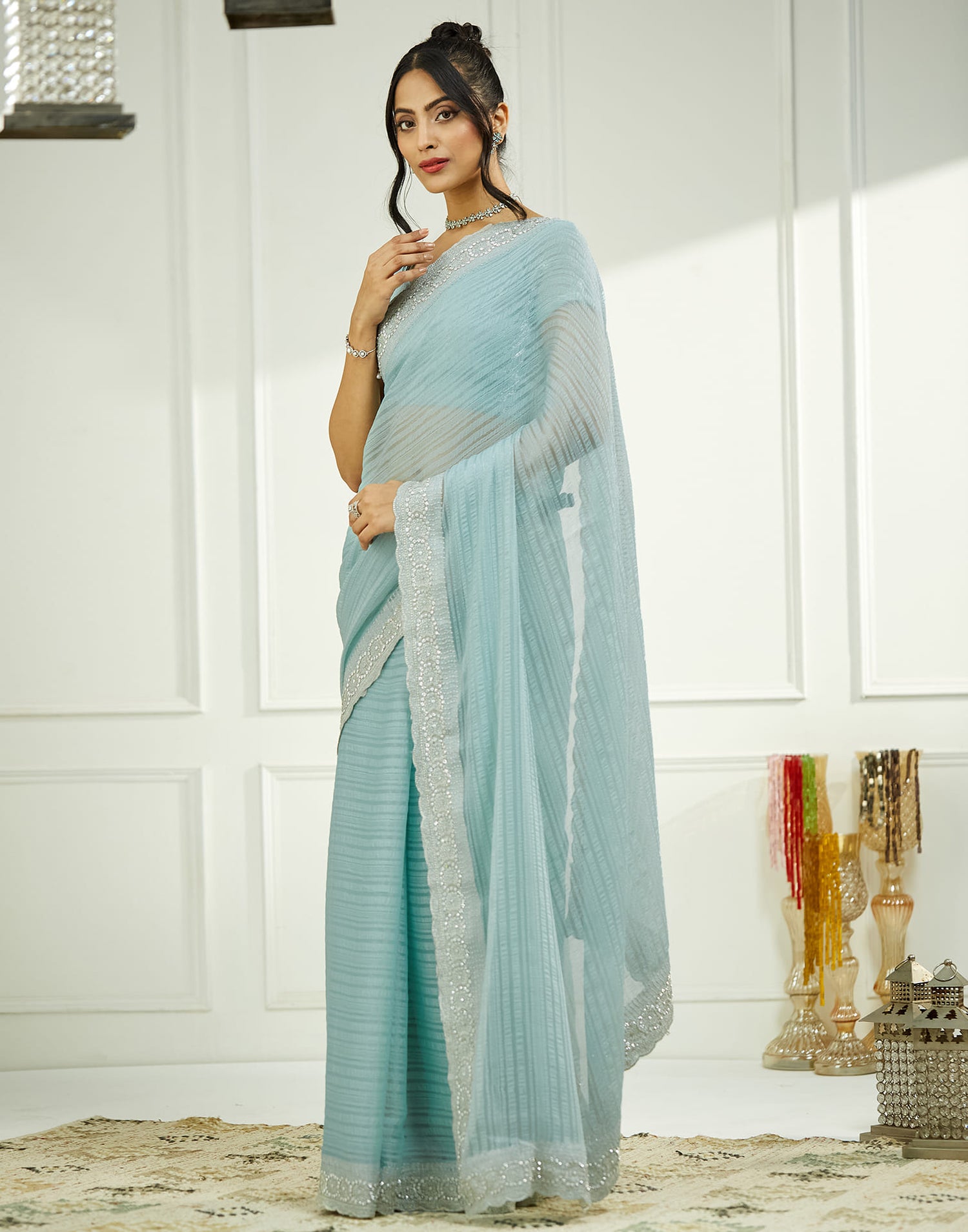 Powder Blue Chiffon Self Woven Embellished Saree