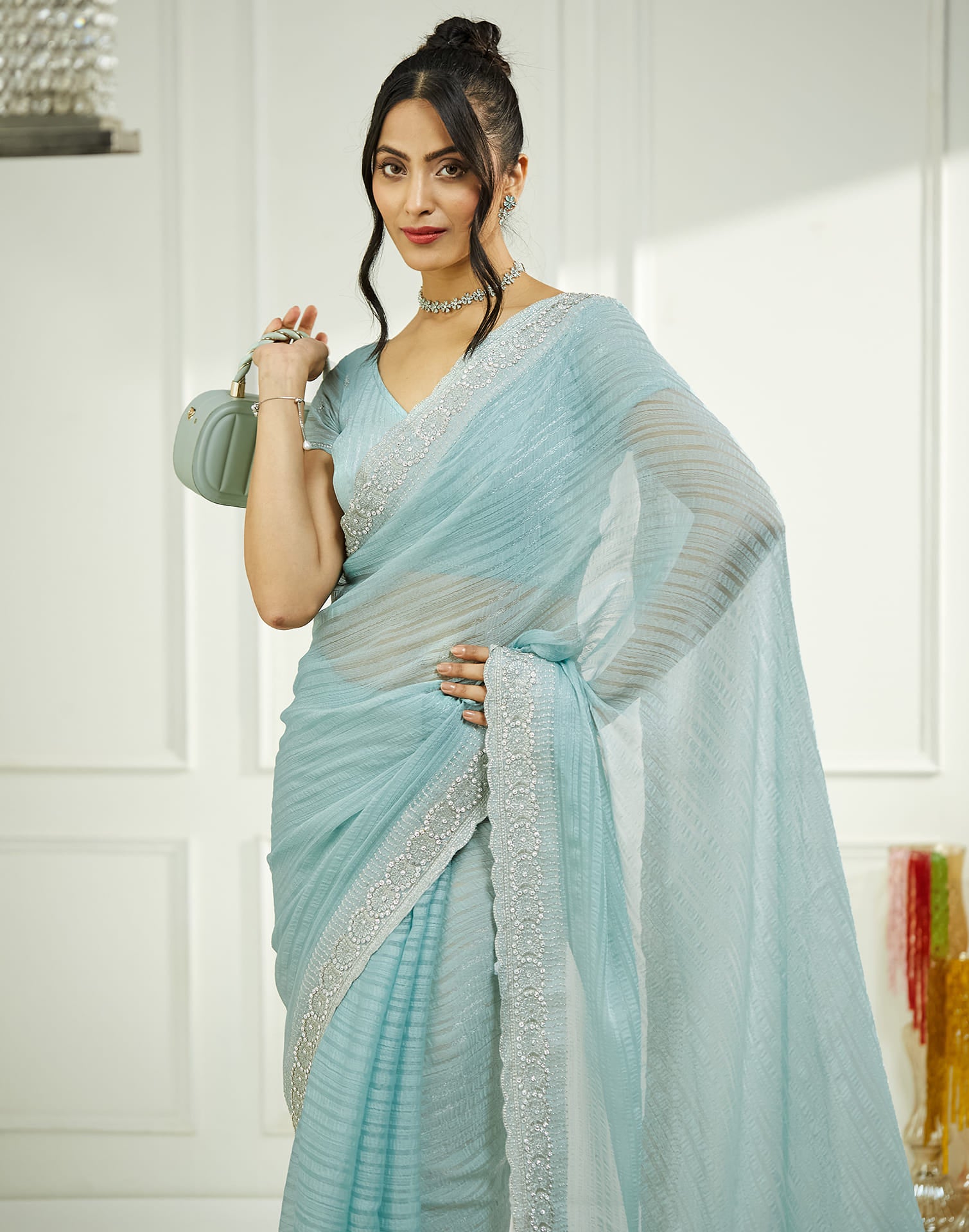 Powder Blue Chiffon Self Woven Embellished Saree