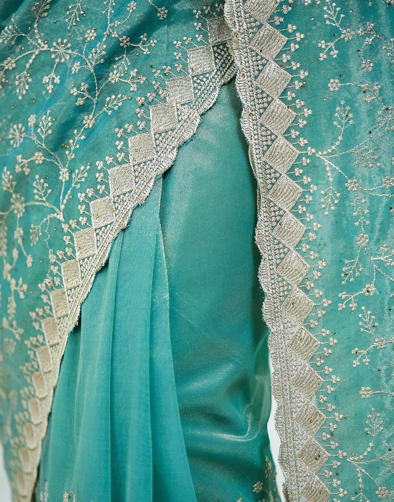 Teal Green. Golden Shimmer Embroidery Embellished Saree