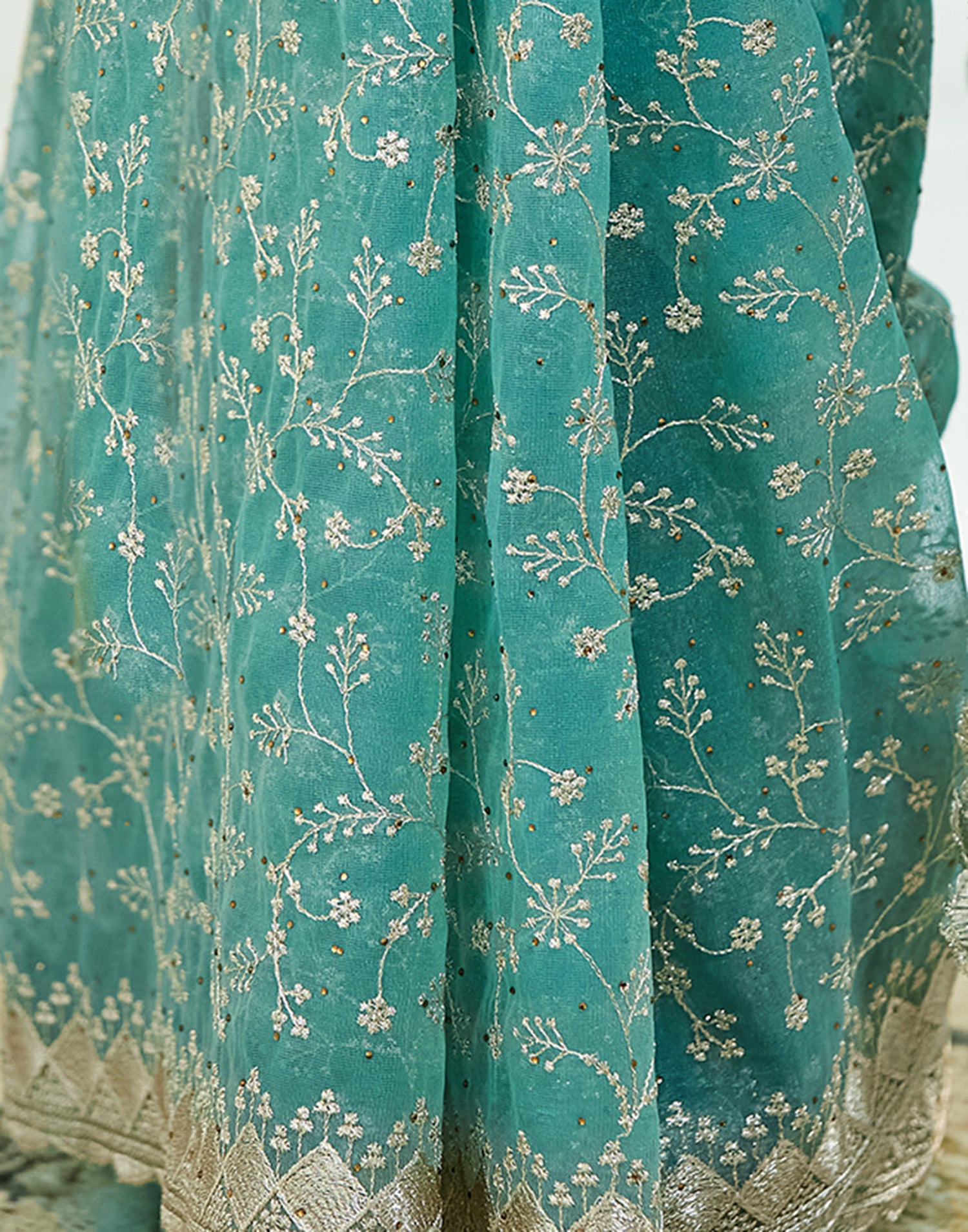 Teal Green. Golden Shimmer Embroidery Embellished Saree