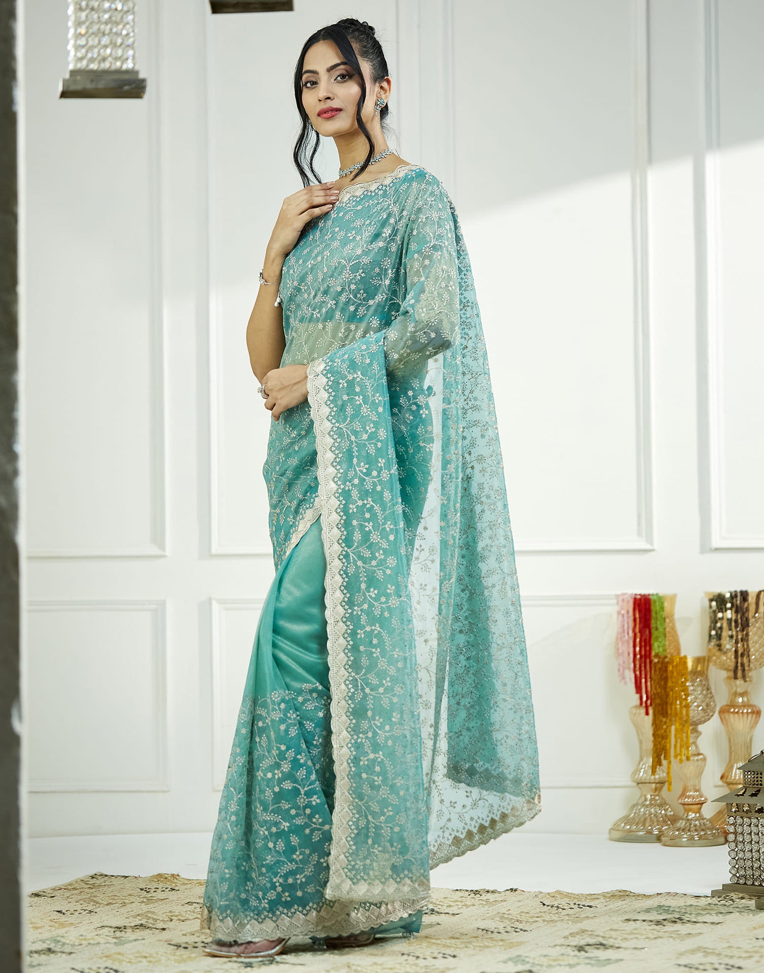 Teal Green. Golden Shimmer Embroidery Embellished Saree