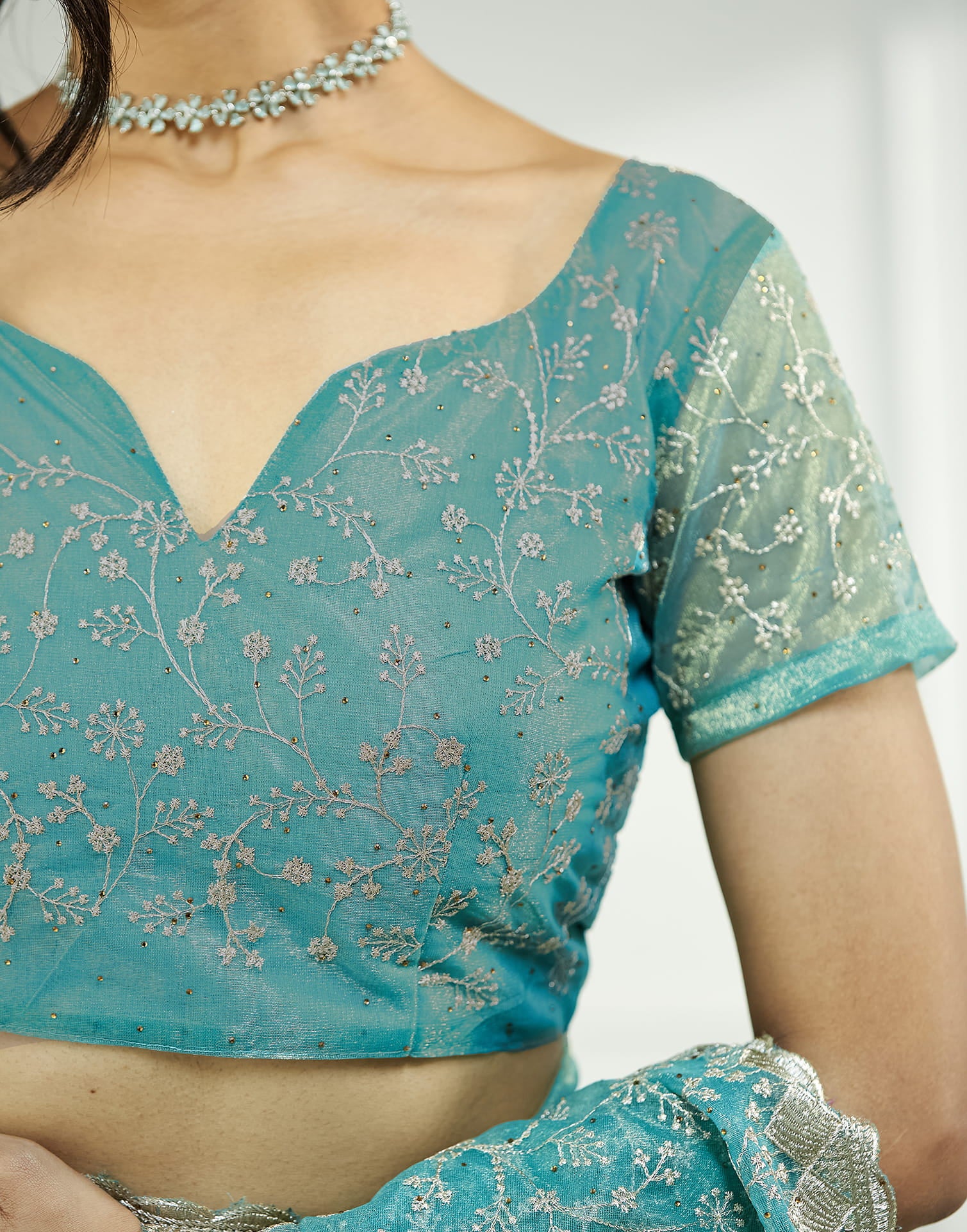 Teal Green. Golden Shimmer Embroidery Embellished Saree