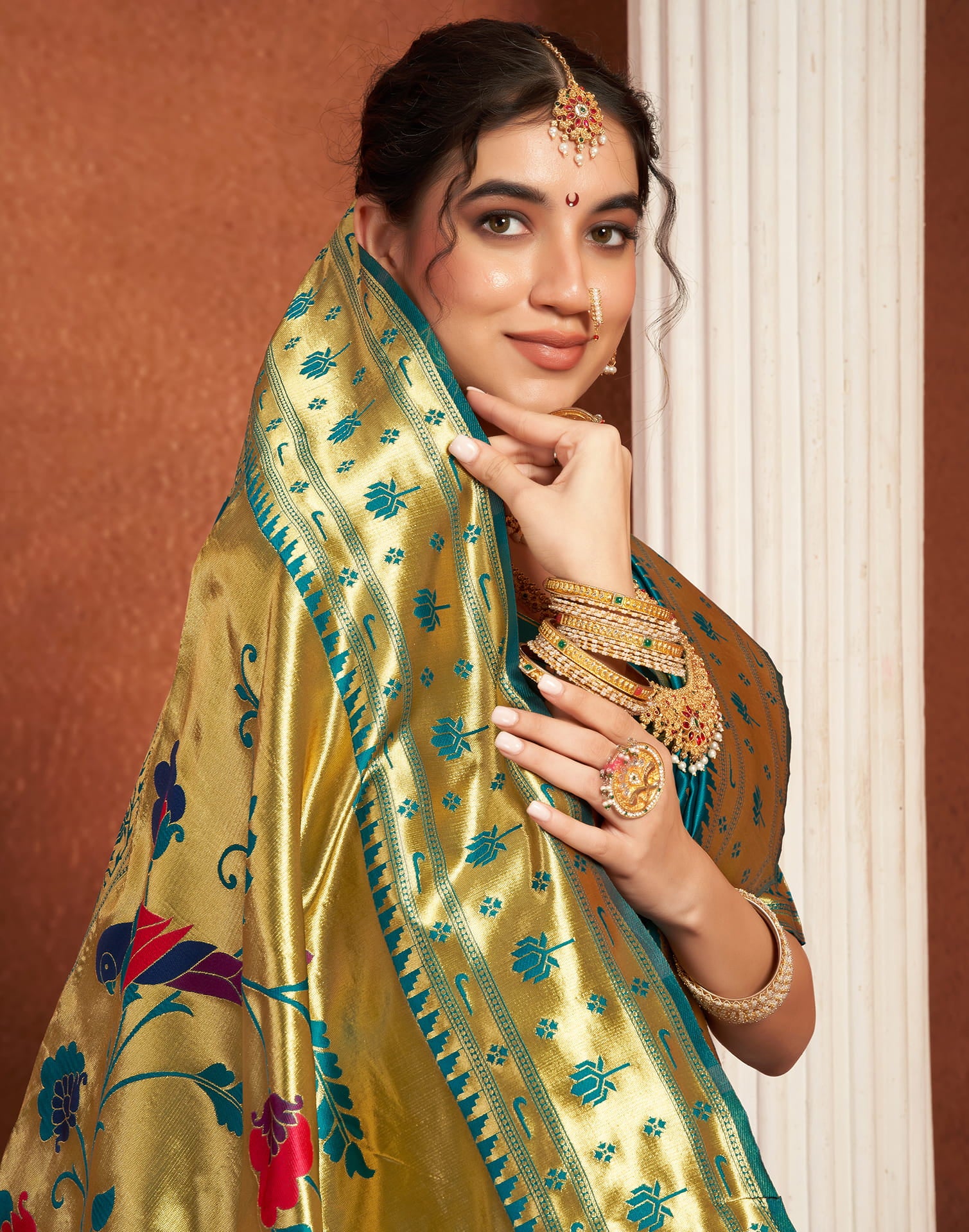 Teal Green Silk Woven Paithani Saree