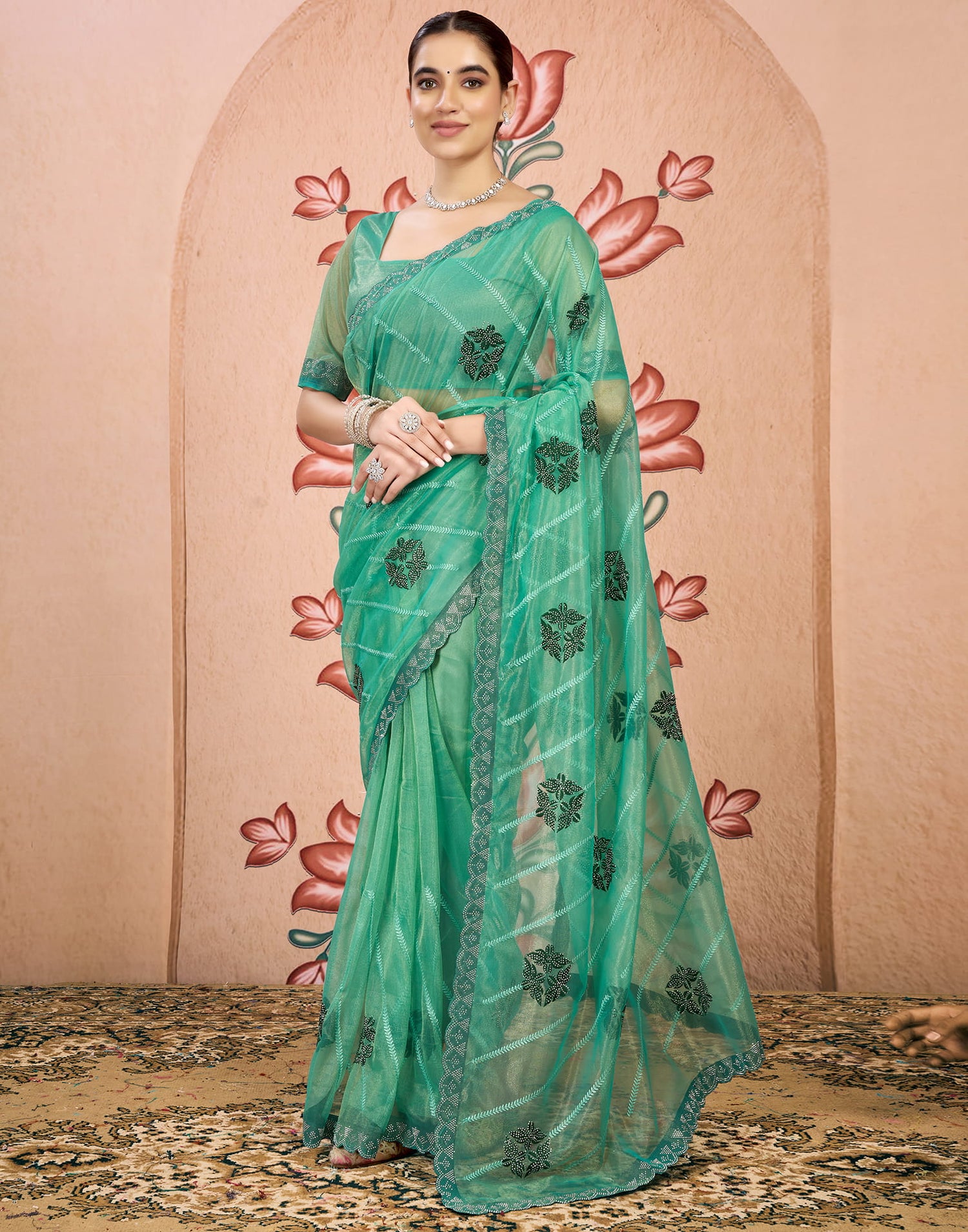 Sea Green Net Embroidery Embellished Saree