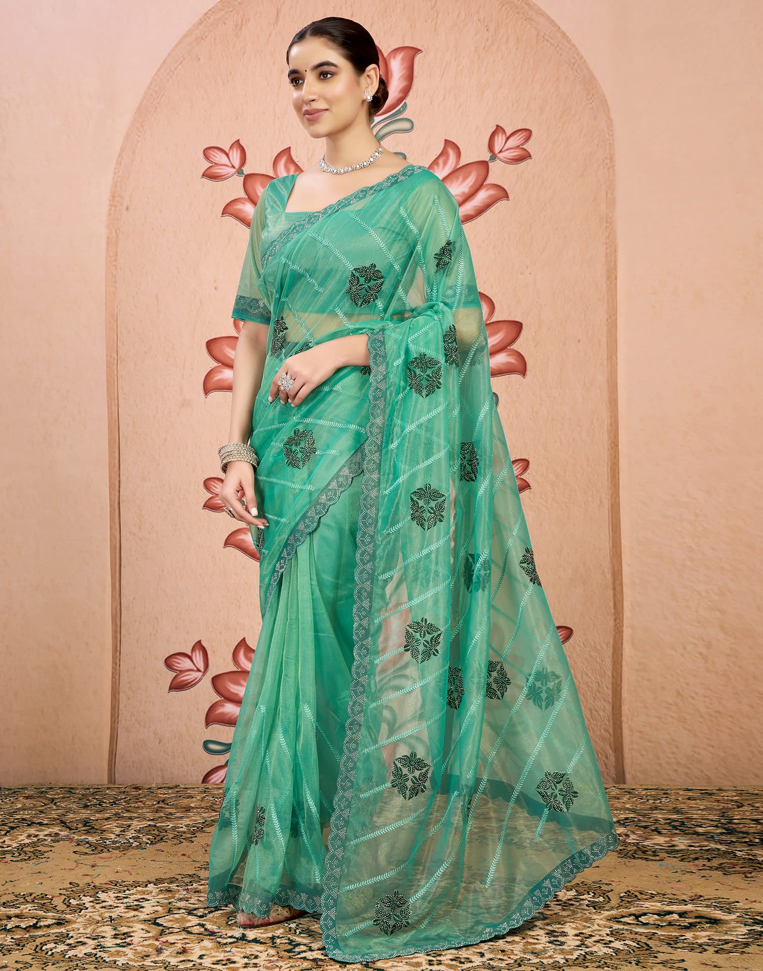 Sea Green Net Embroidery Embellished Saree