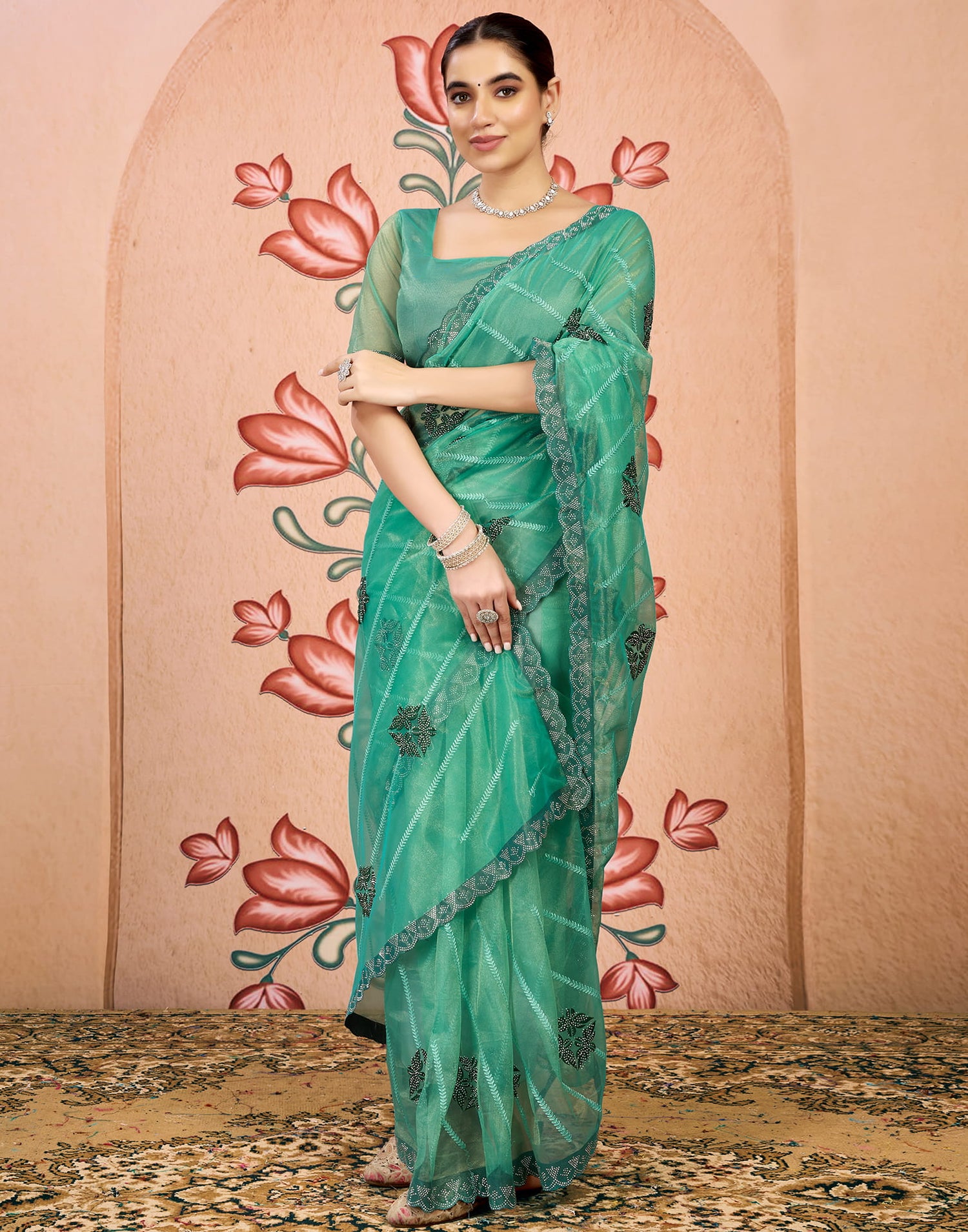 Sea Green Net Embroidery Embellished Saree