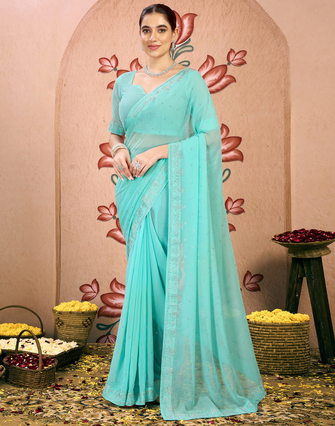 Light Turquoise Georgette Swarovski Embellished Saree