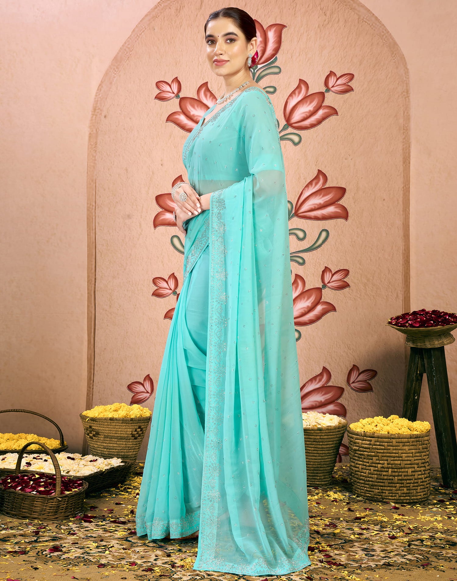 Light Turquoise Georgette Swarovski Embellished Saree