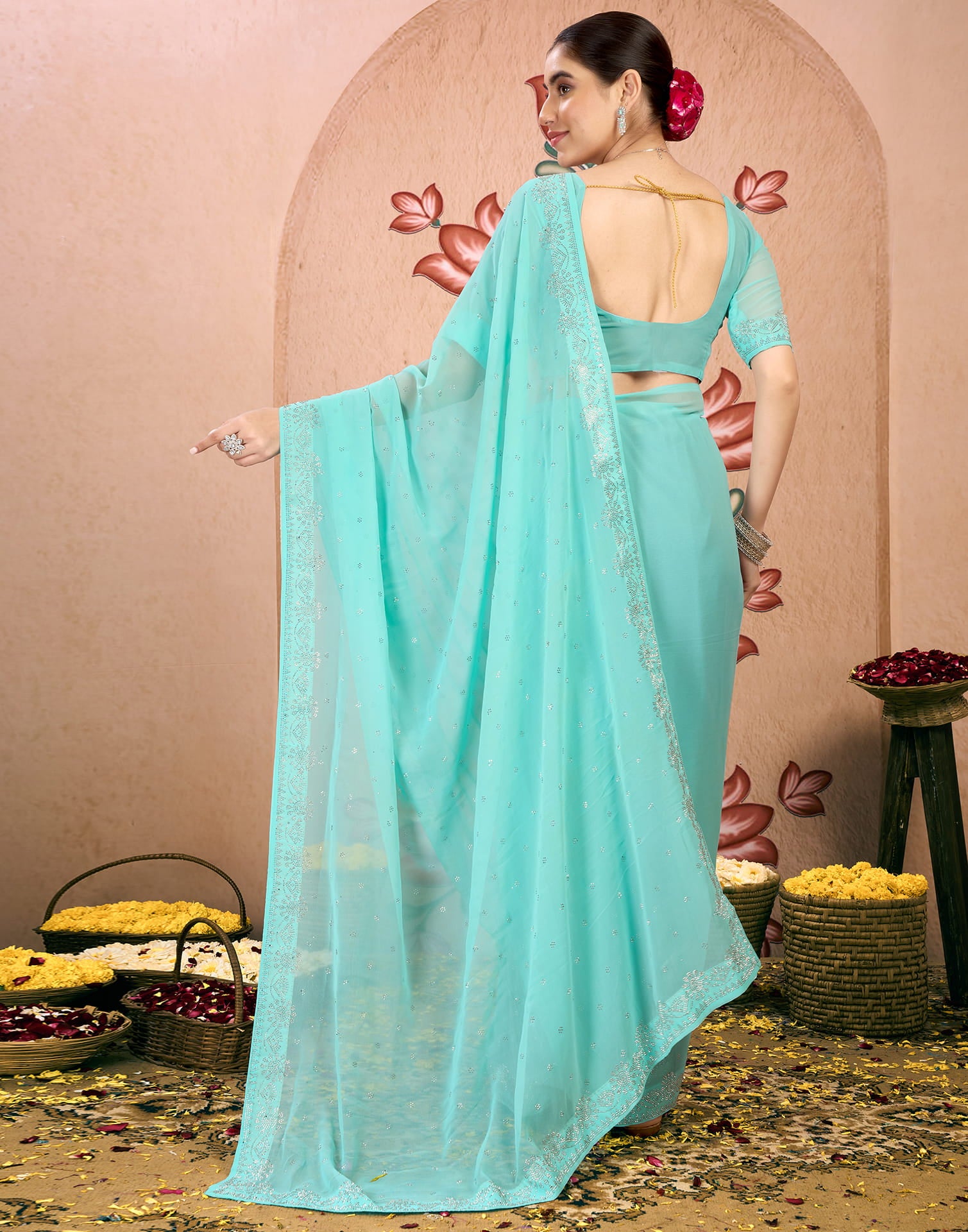 Light Turquoise Georgette Swarovski Embellished Saree