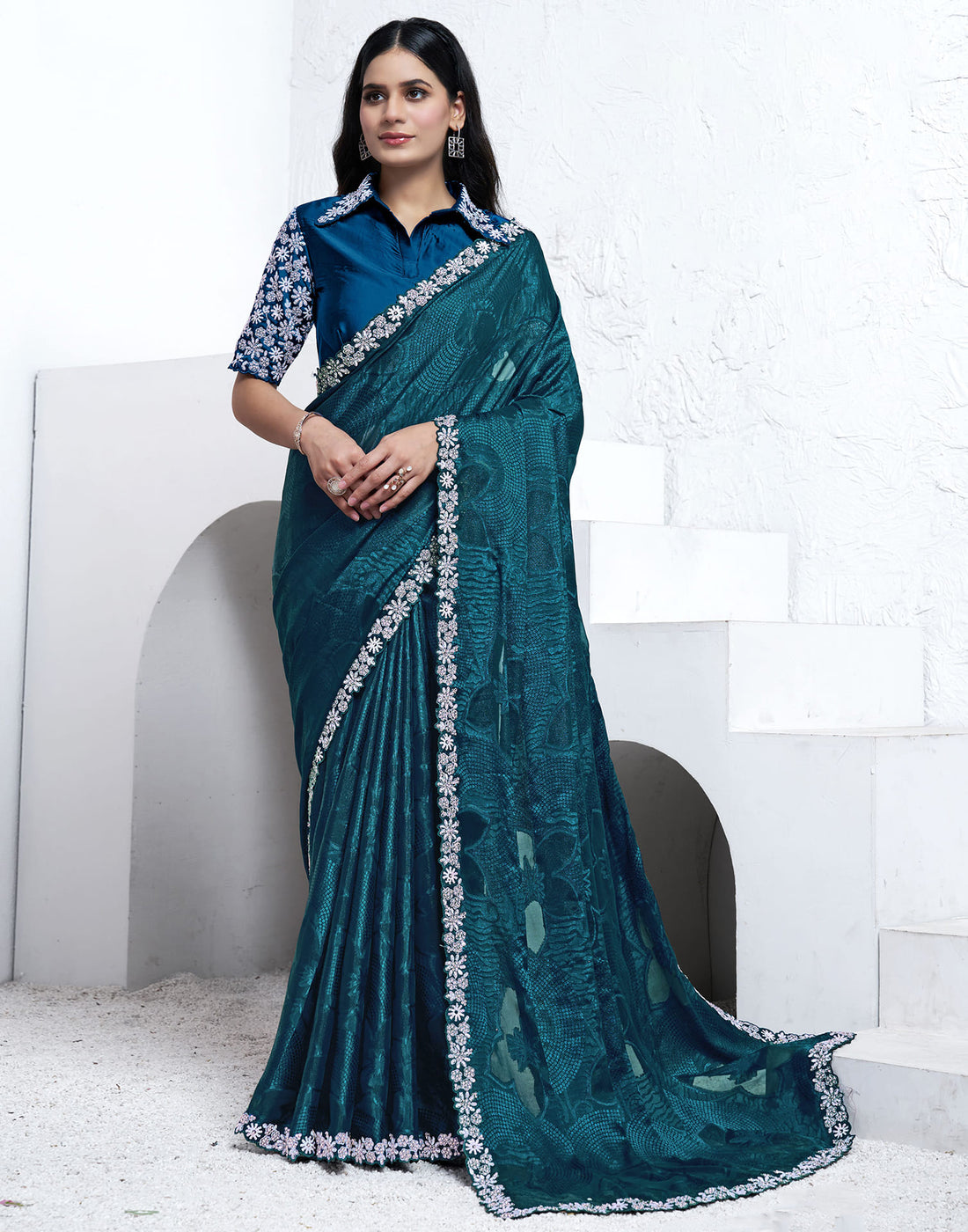 Peacock Blue Georgette Weaving Embellished Saree