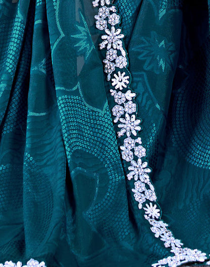Peacock Blue Georgette Weaving Embellished Saree