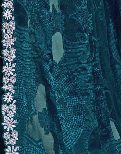 Peacock Blue Georgette Weaving Embellished Saree