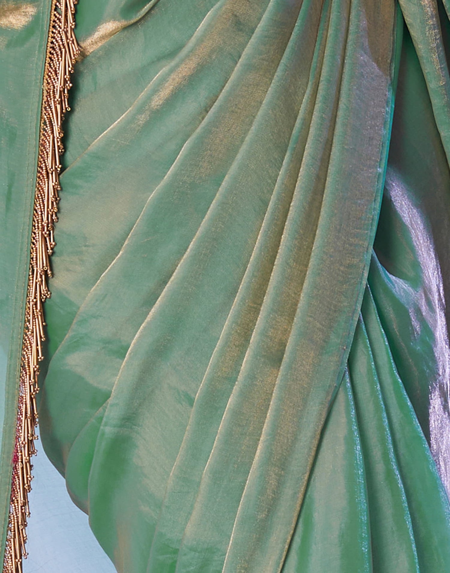 Green Tissue Silk Dyed Solid Saree