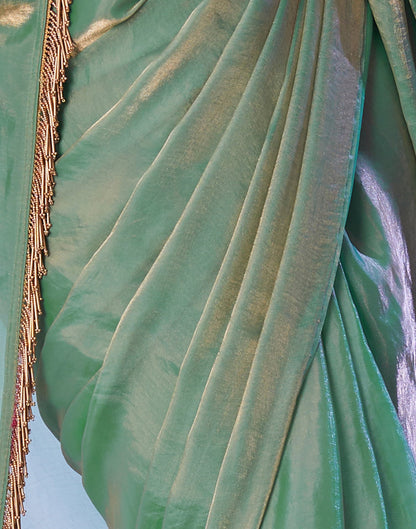 Green Tissue Silk Dyed Solid Saree
