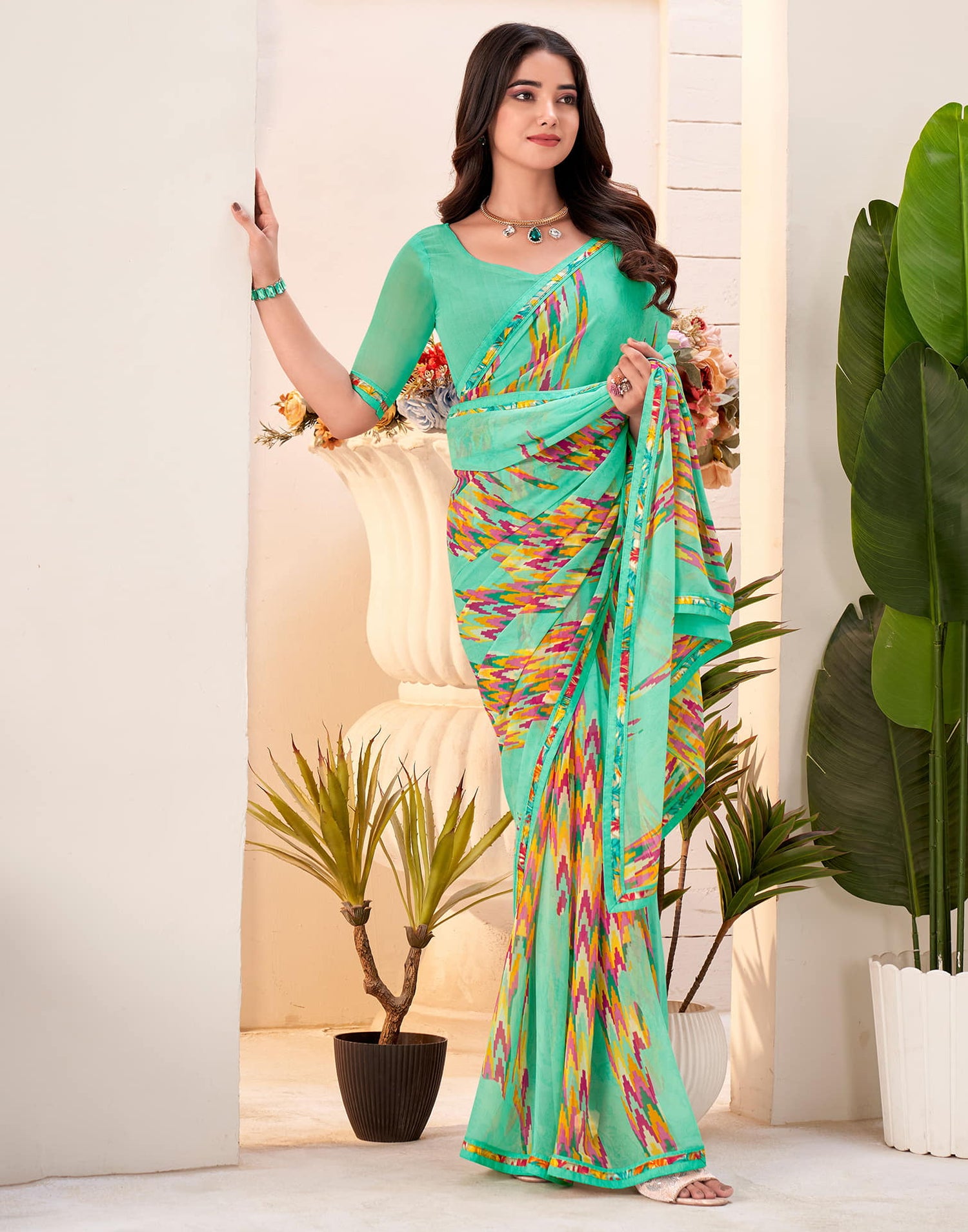 Teal Green Georgette Geometric Printed Saree
