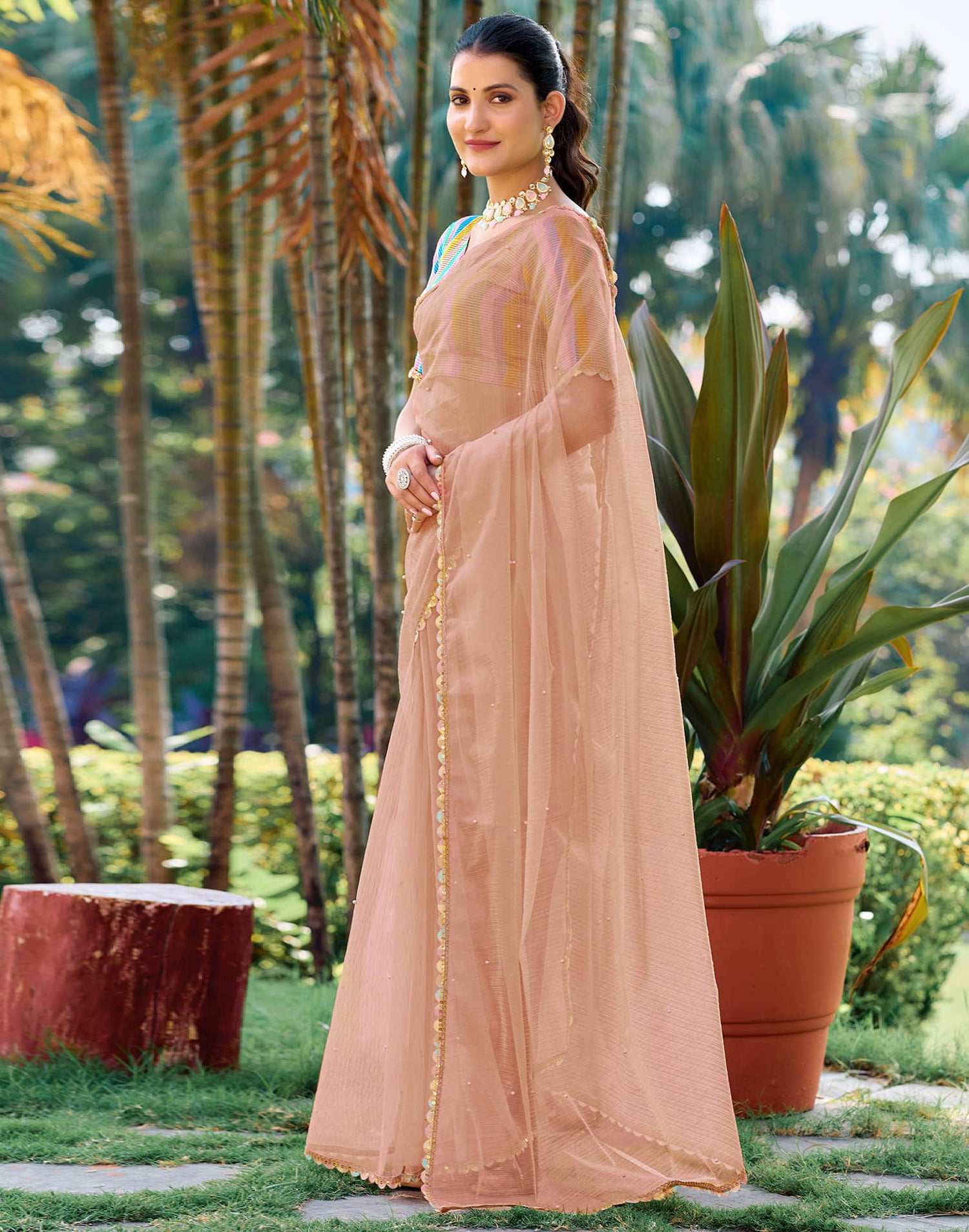 Peach Shimmer Net Pearl Work Embellished Saree