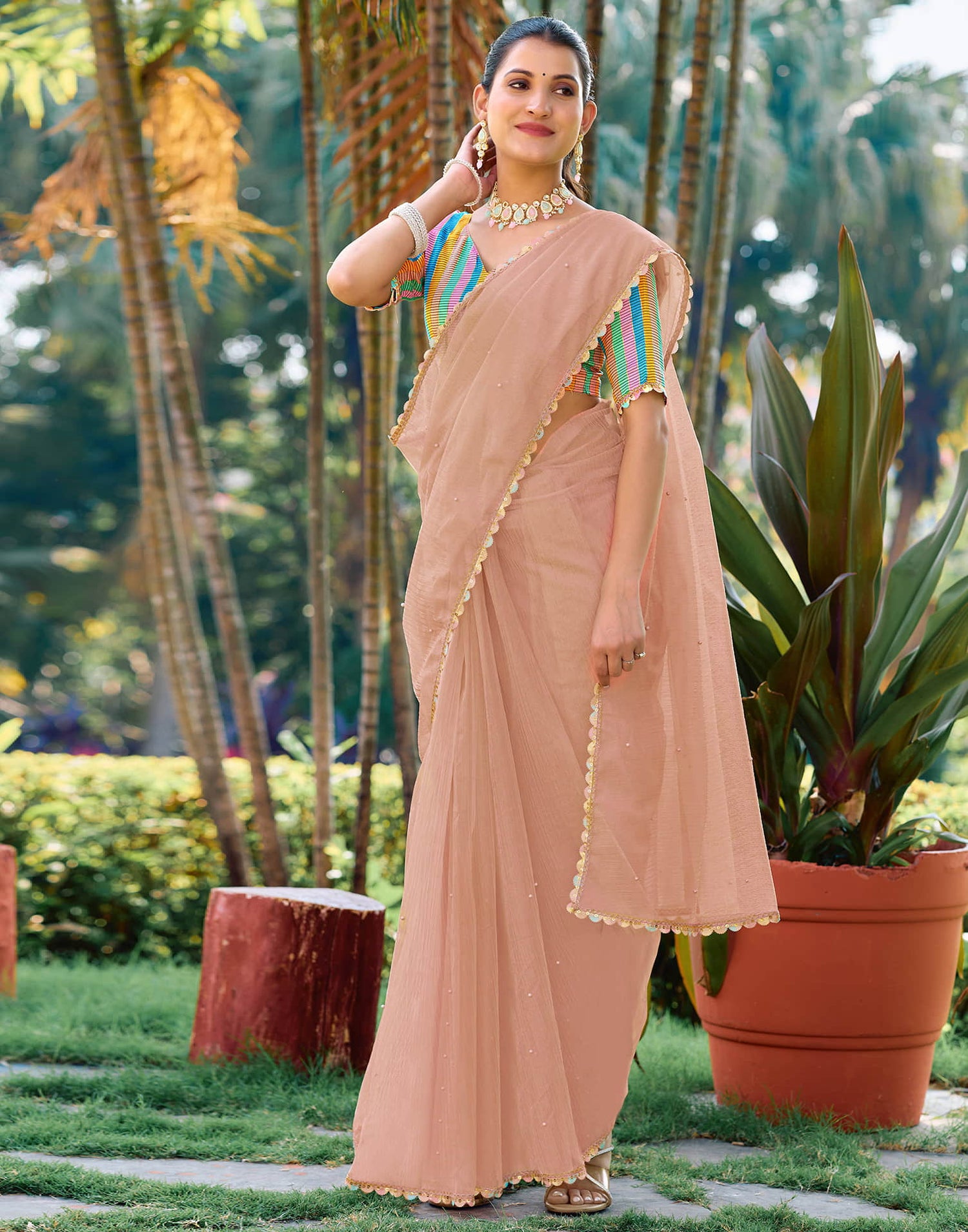 Peach Shimmer Net Pearl Work Embellished Saree