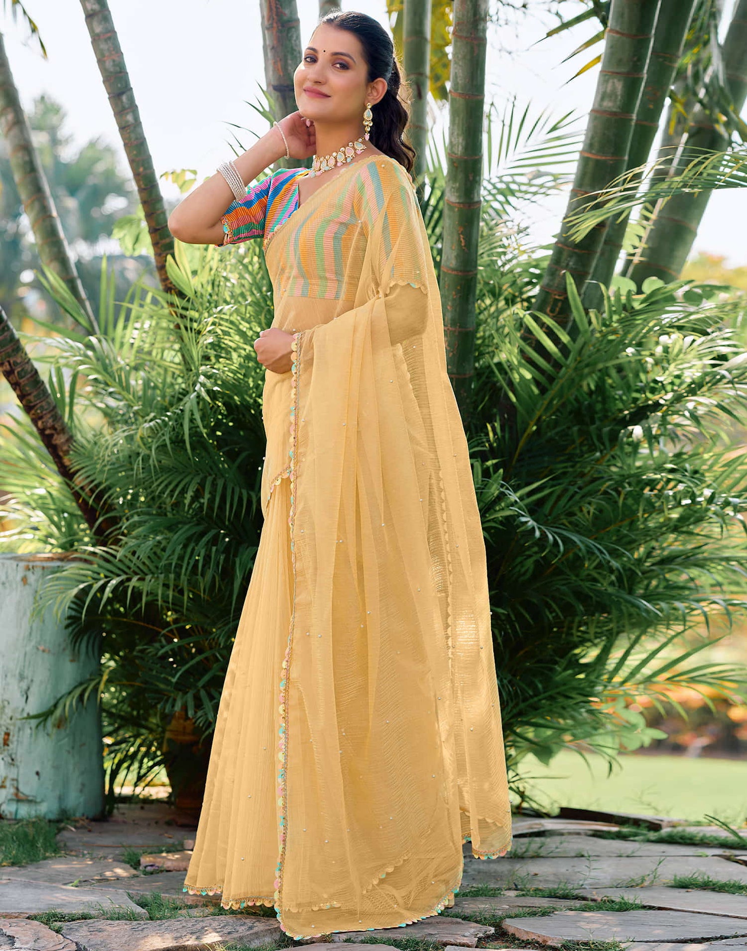 Light Yellow Shimmer Net Pearl Work Embellished Saree