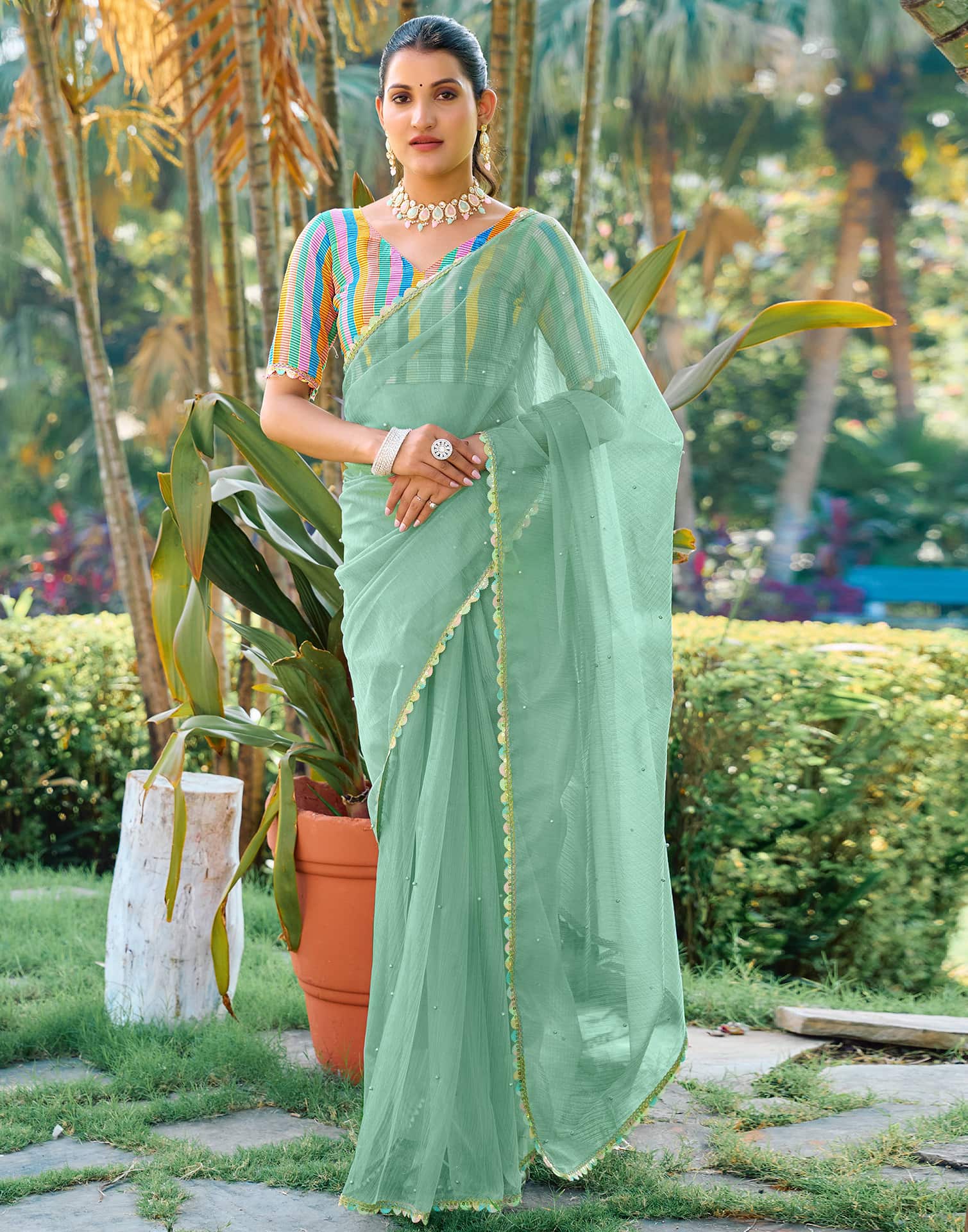 Pista Green Shimmer Net Pearl Work Embellished Saree