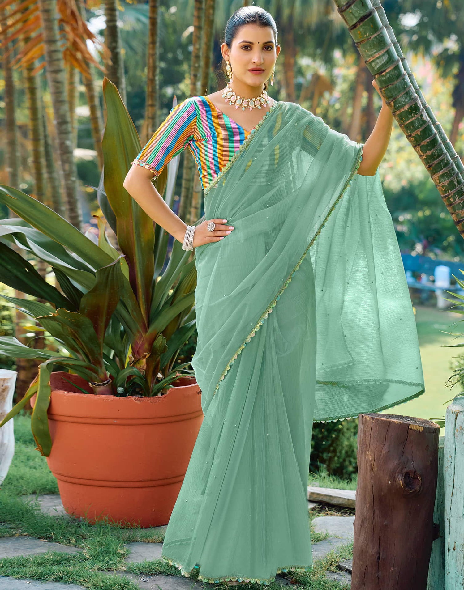 Pista Green Shimmer Net Pearl Work Embellished Saree