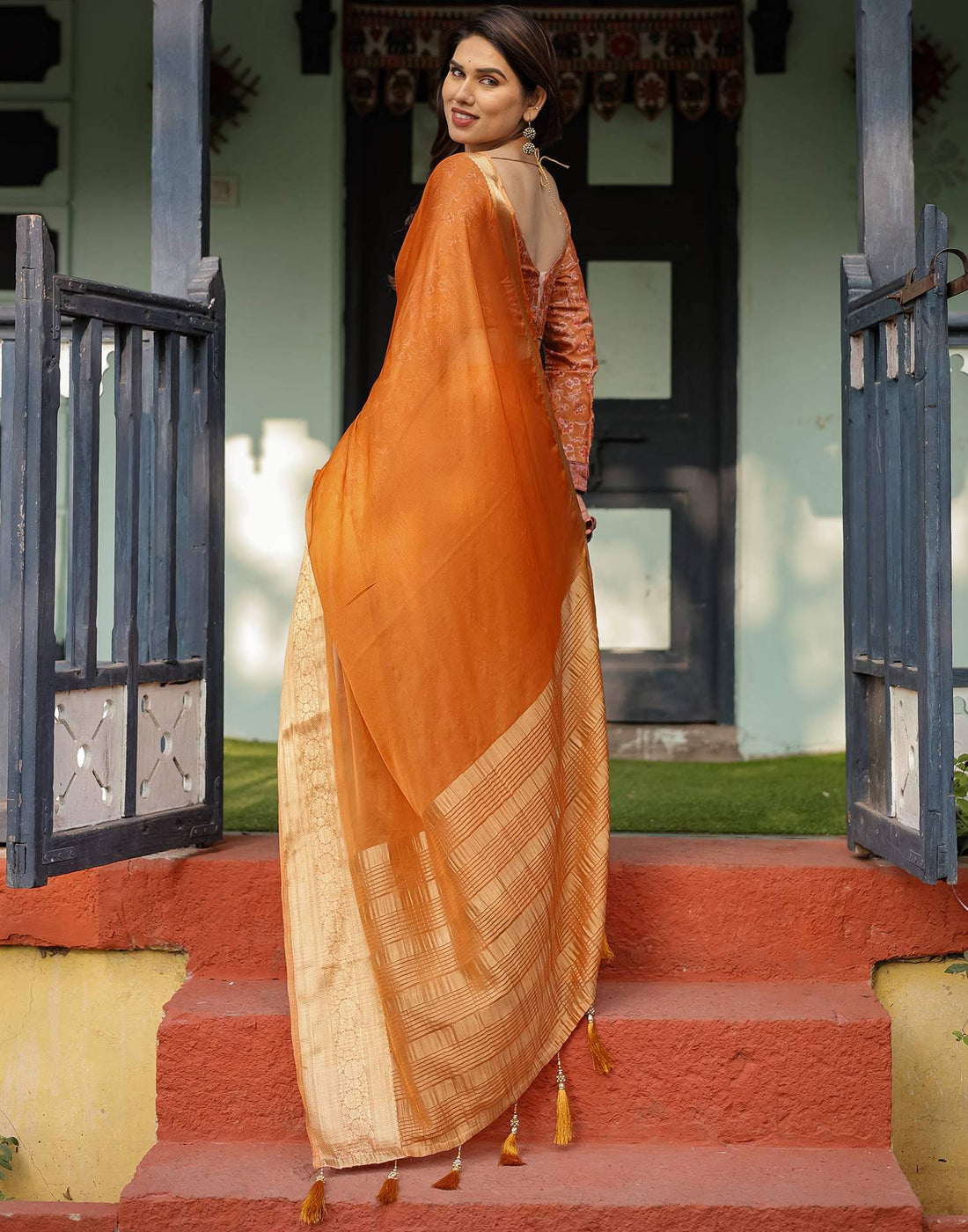 Dark Orange Chiffon Woven Solid Saree