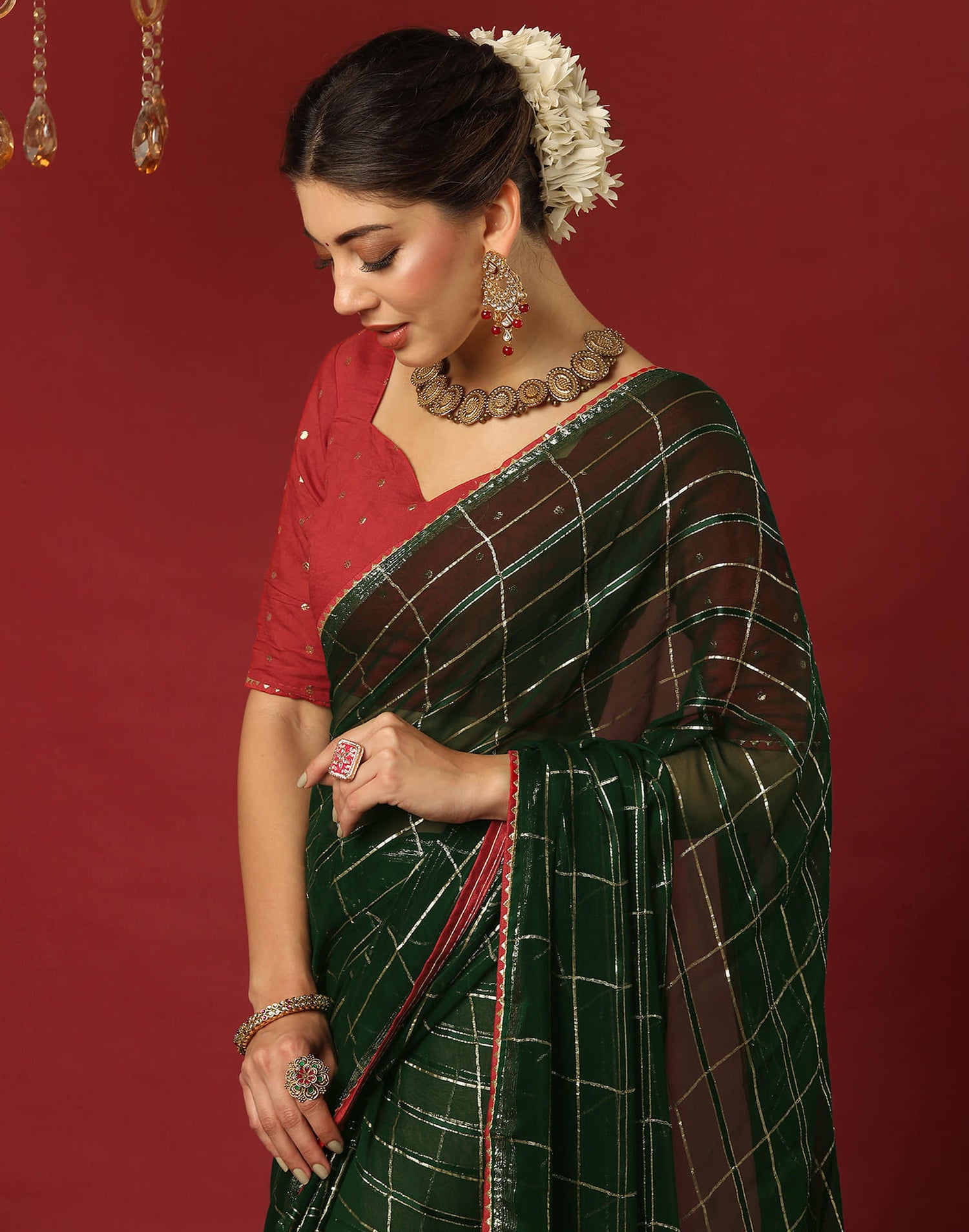 Dark Green Georgette Zari Woven Saree