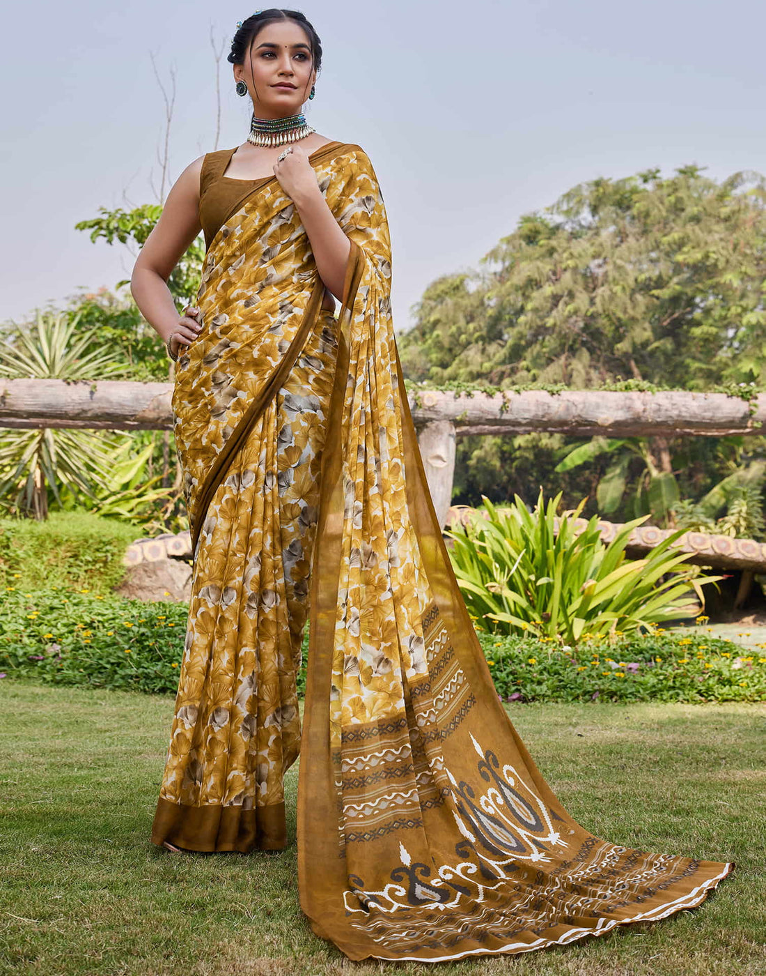 Turmeric Yellow Georgette Floral printed Saree