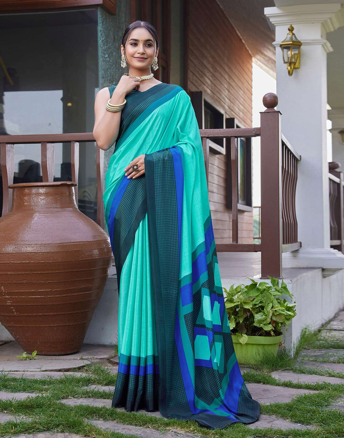 Turquoise Chinnon Printed Saree