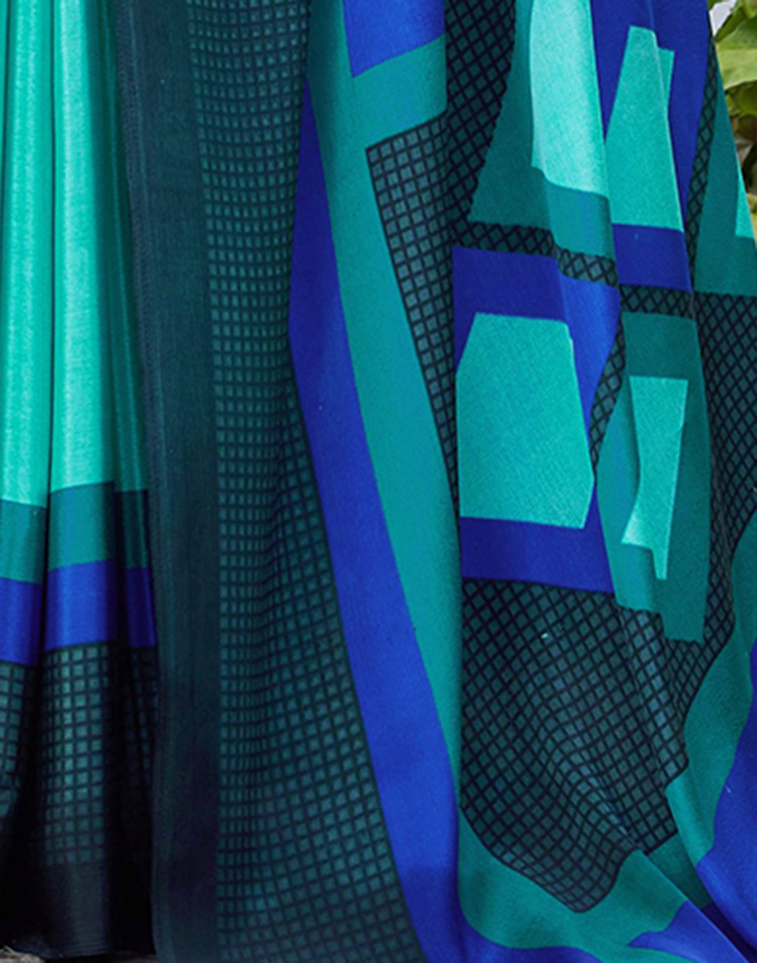 Turquoise Chinnon Printed Saree