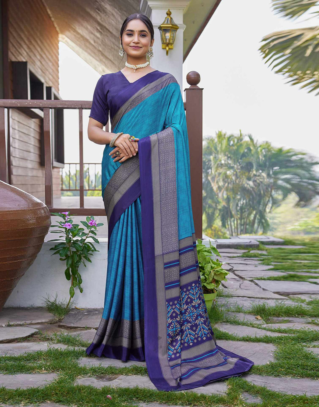 Teal Blue Chinnon Printed Saree