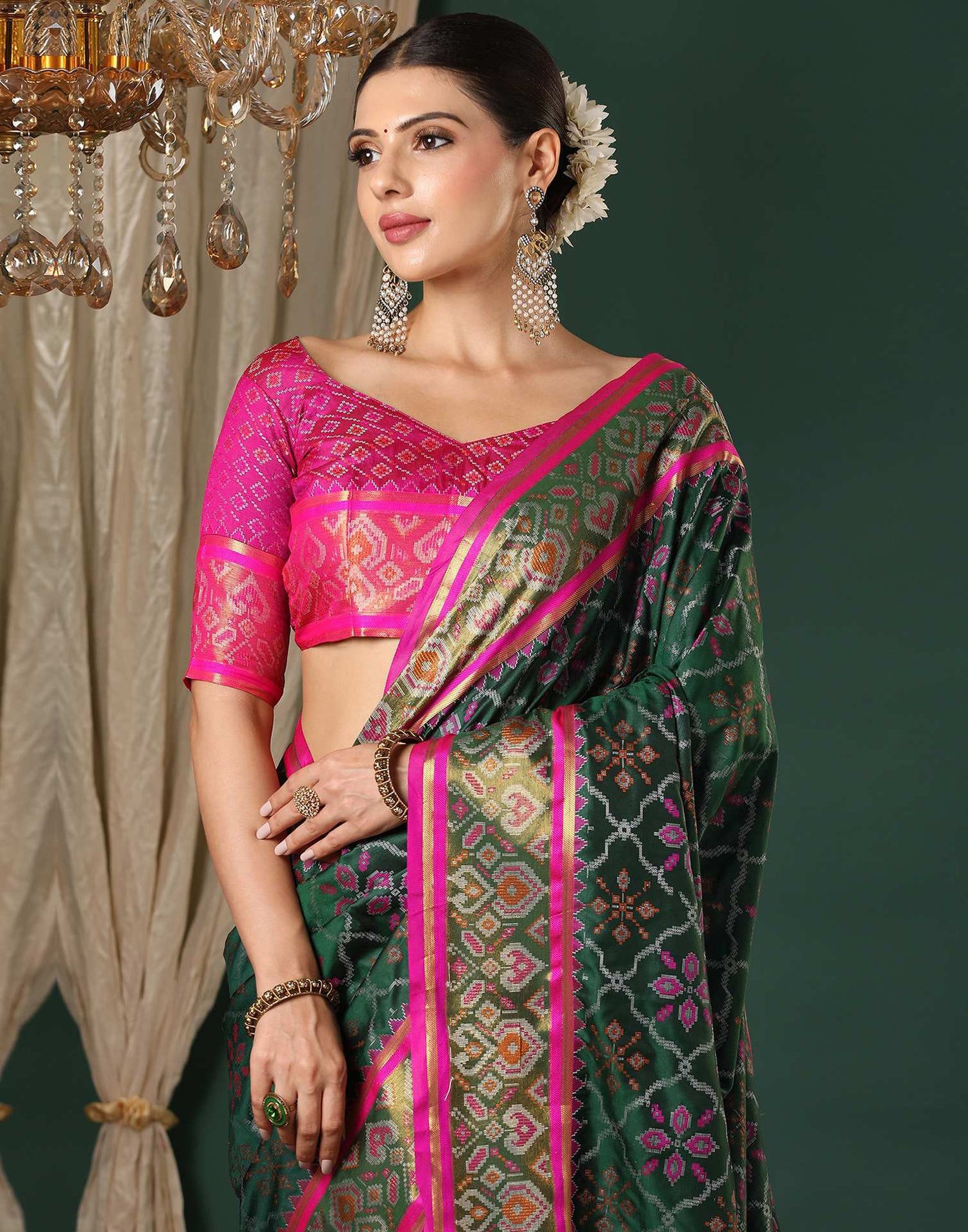 Dark Green Silk Patola Woven Saree